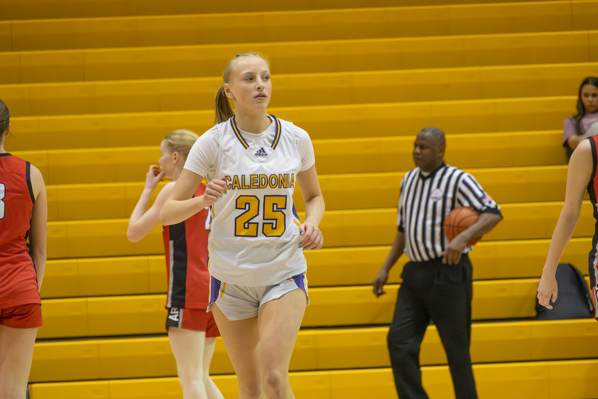 Ellie Radel moves up the court for the scots. (Photo By Landry Mueller)