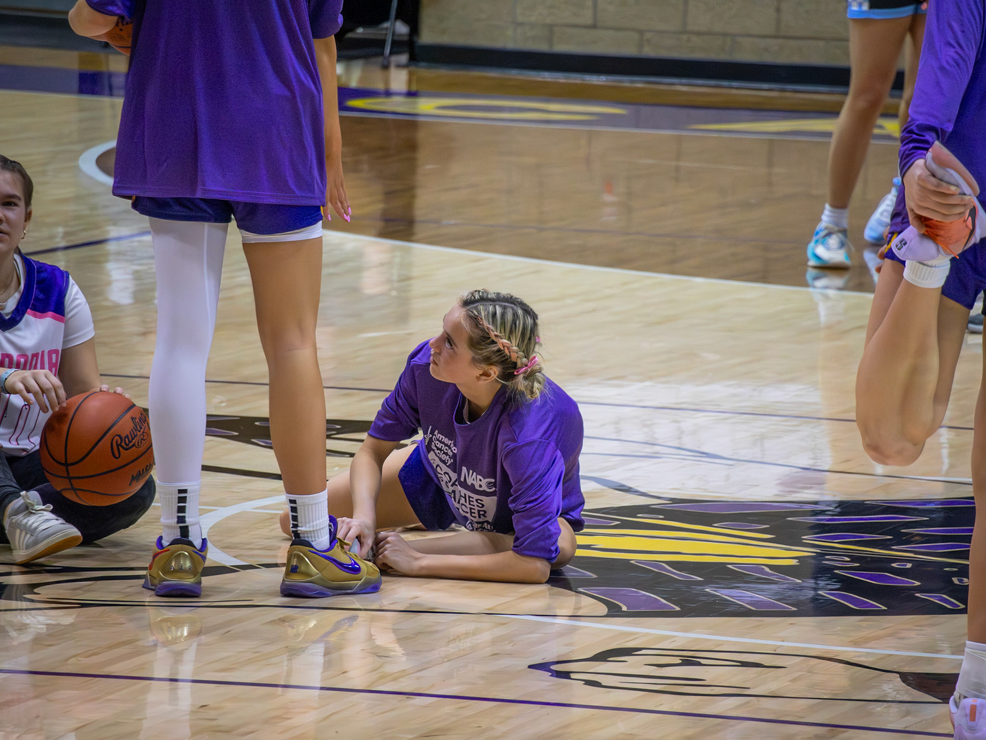 Maya Terryn gets loose and focused ahead of the big game. (Photo by Aibree Akers)