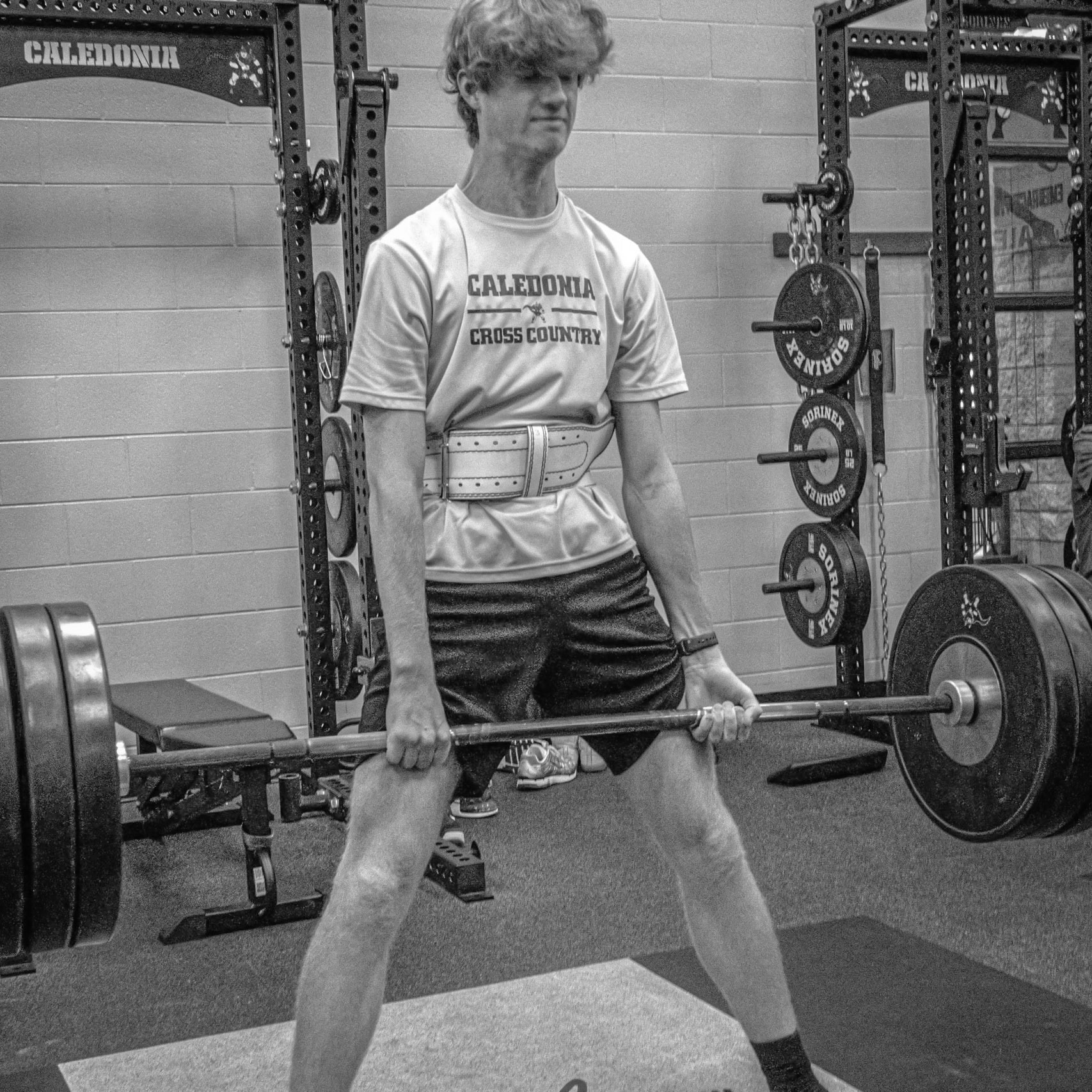 Grant Feldpausch confidently lifts 315 pounds, showcasing the hard work he’s put in. (Photo by Joseph Dunn)