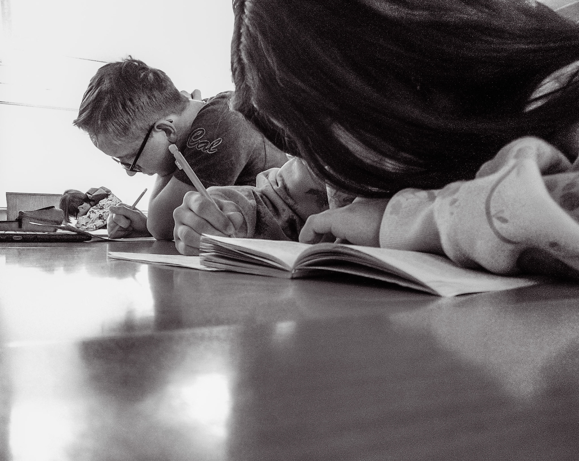 In English class, Reagan Stevens and Zack Zupin study "Of Mice And Men"  (Photo by Kaydence Kammer)