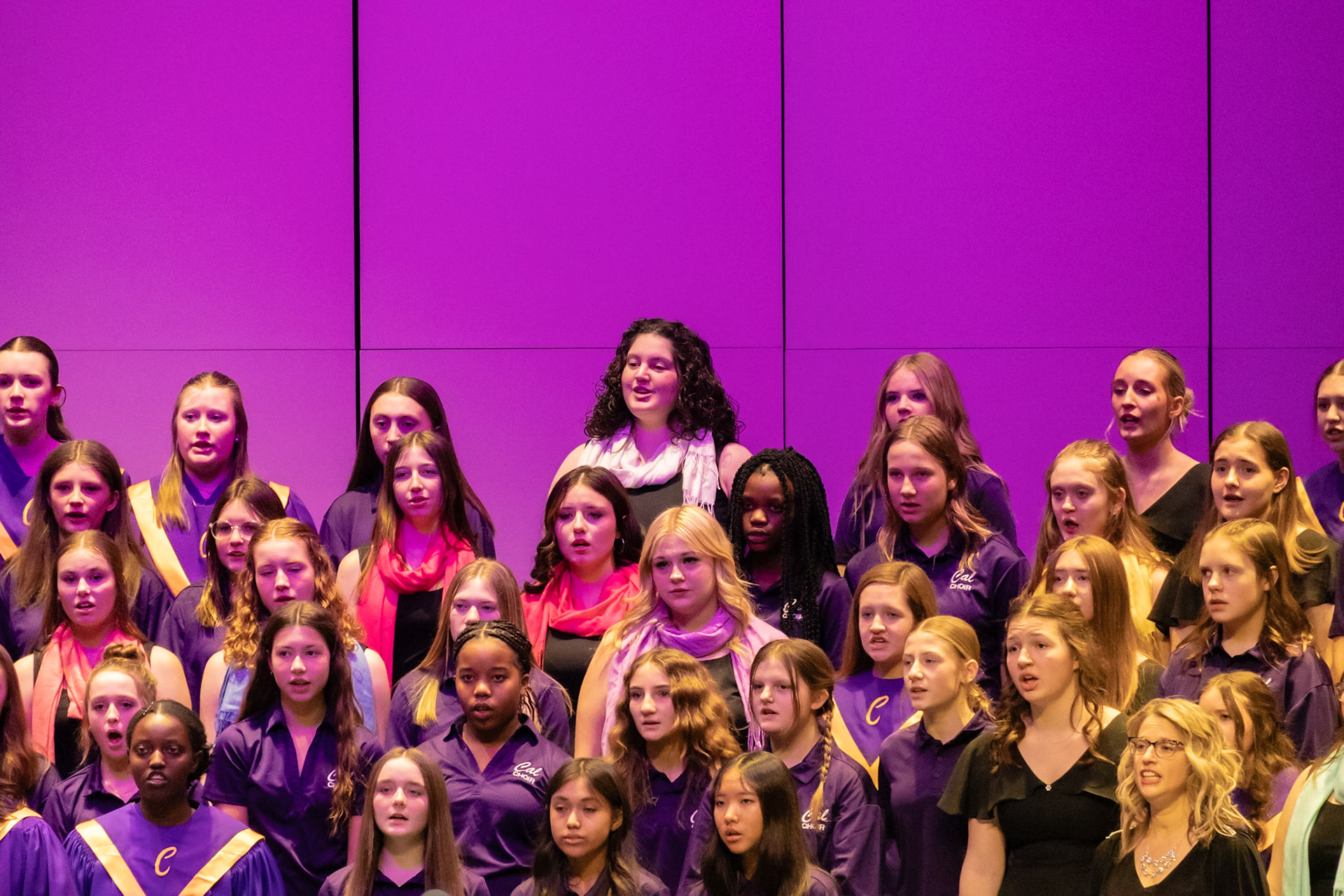 Ella Rigley, with her middle and high school peers, sing proudly with joy, closing the 2026 Winter Treble-Choir Concert. (Photo by Lucas Swartz)