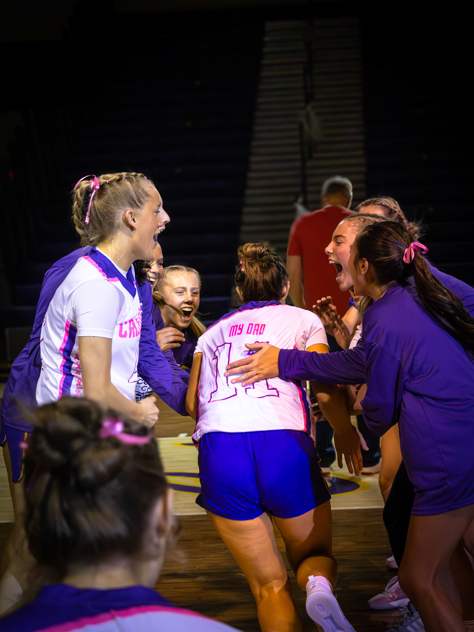 Proud, Baylee soaks in the cheers as her name and number echo through the gym. (Photo by Aibree Akers)