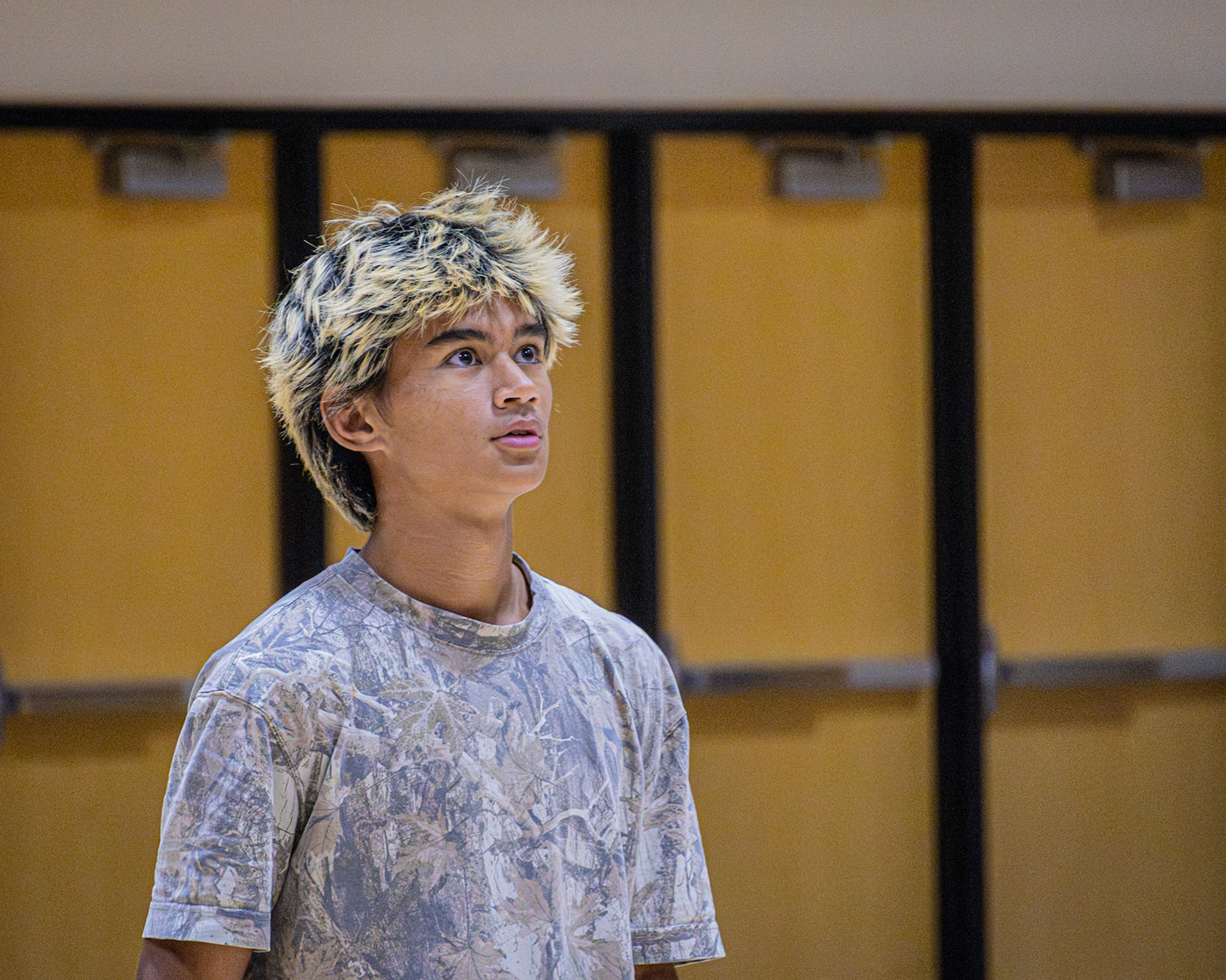 Warming up for the game, Robert Day focuses on making solid plays to help his team in their four-way volleyball match. (Photo by Ella-Grace Wickens)