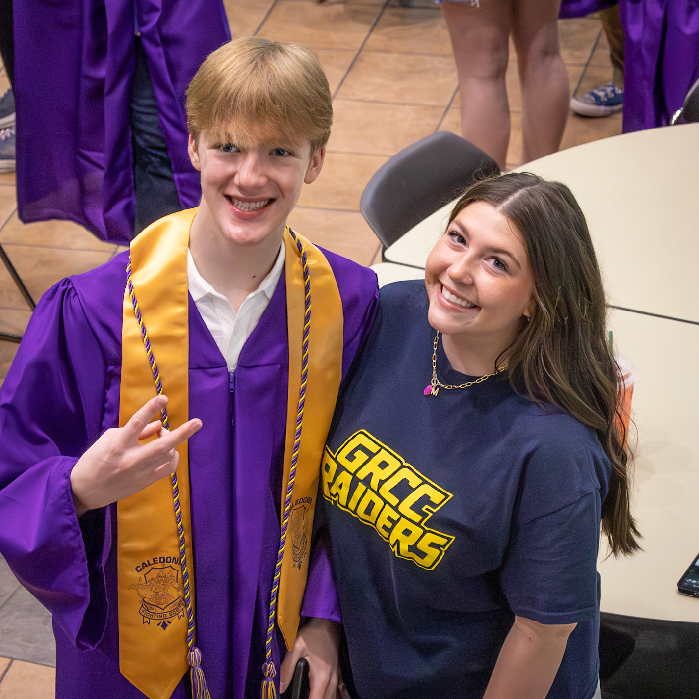 Maddie Pittman and Christian Moorlag smile together, enjoying the morning before the Senior Assembly. (Photo by Emma Garza)