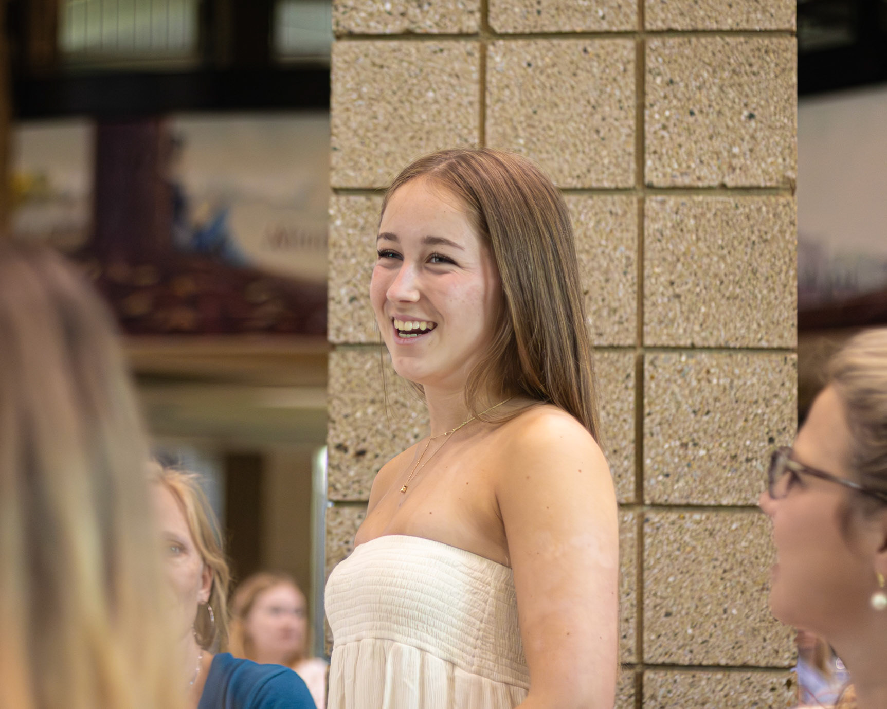 Alma Cortas Diaz stands as the hosts recognize all of our exchange students. (Photo by Mariah Peterson)