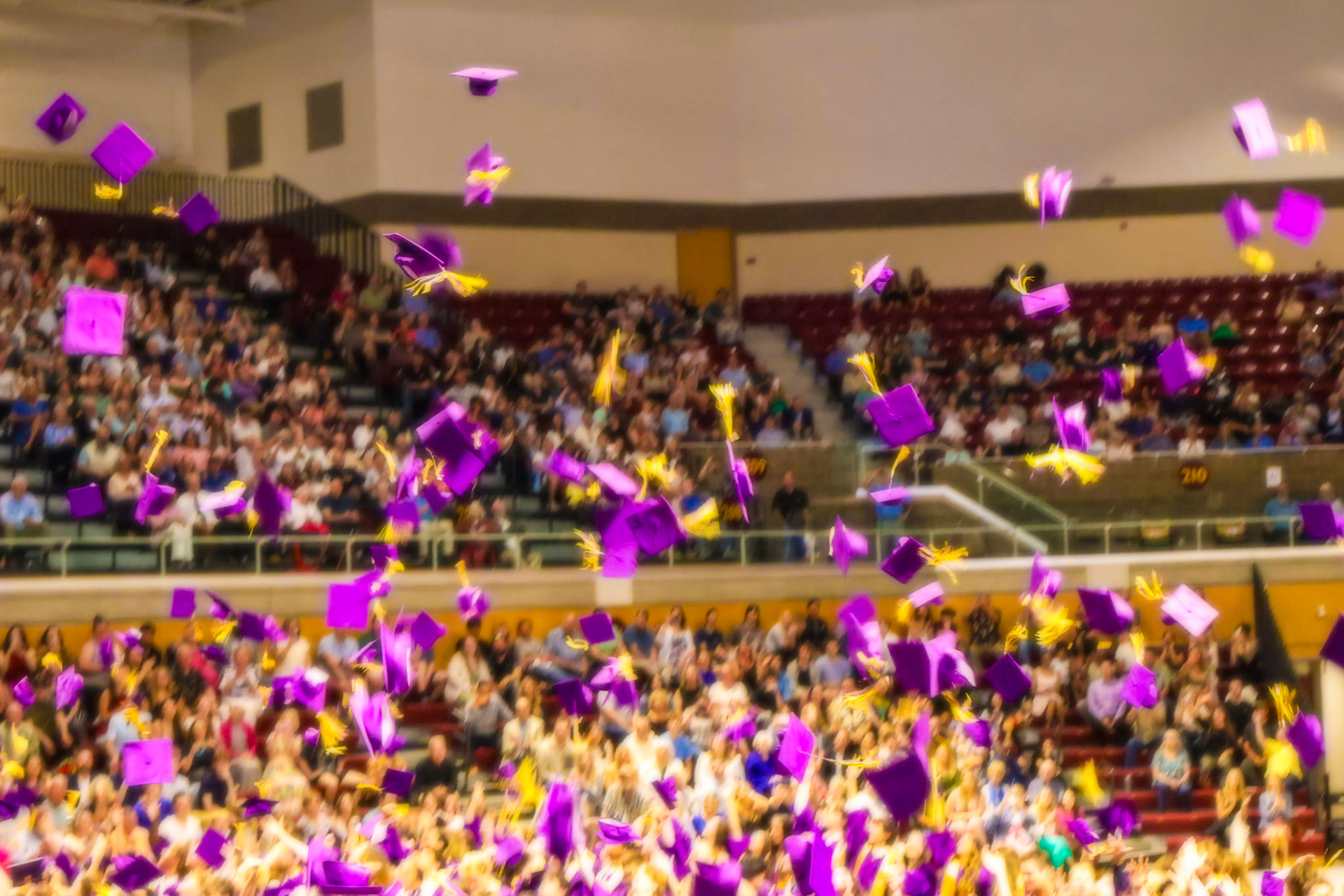 Marking the end of an era, the seniors throw their caps to celebrate graduating from high school. (Photo by Elsha Bytwork)