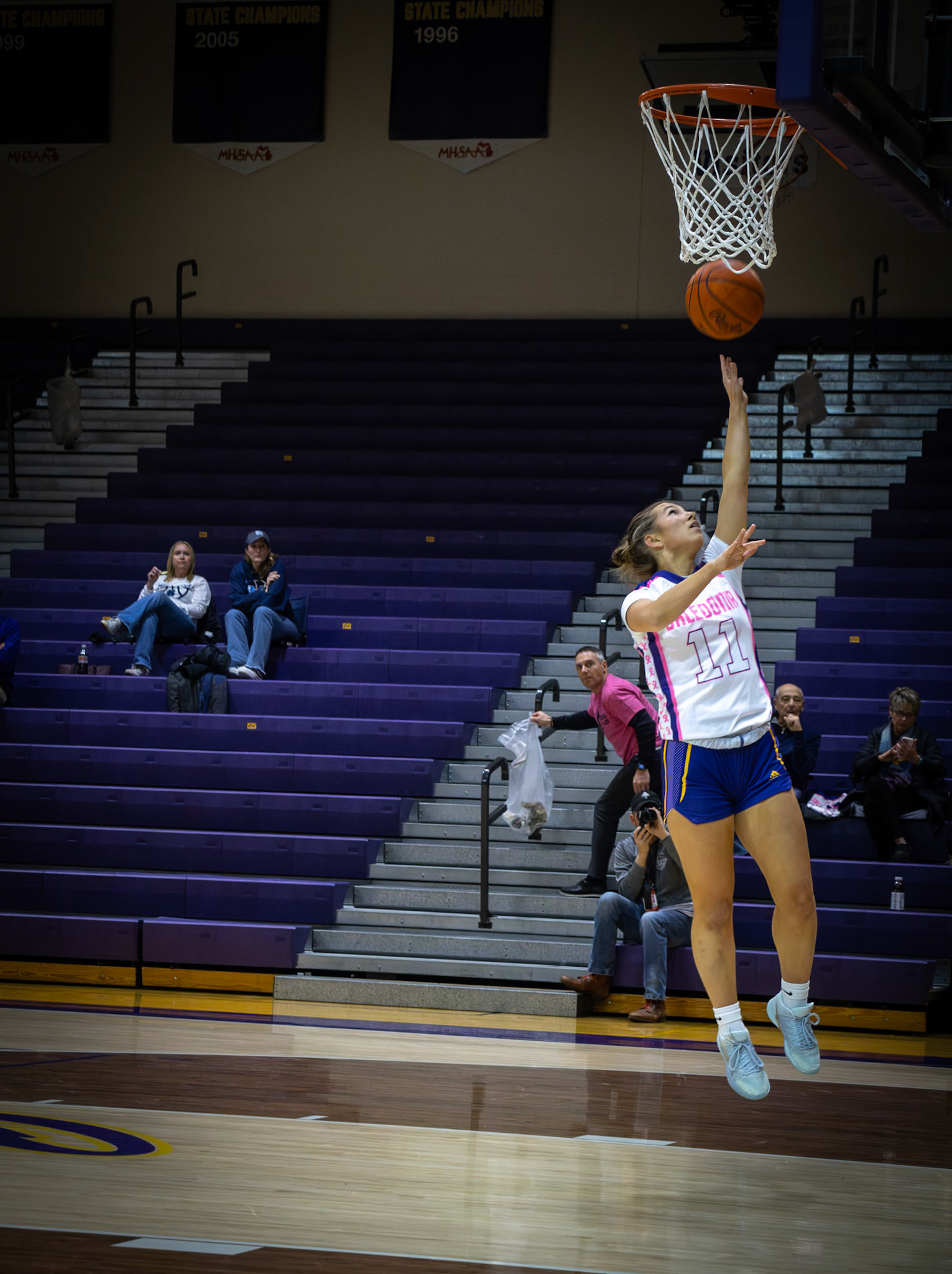 Baylee DeVries rises in the air, attacking the rim. (Photo by Aibree Akers)