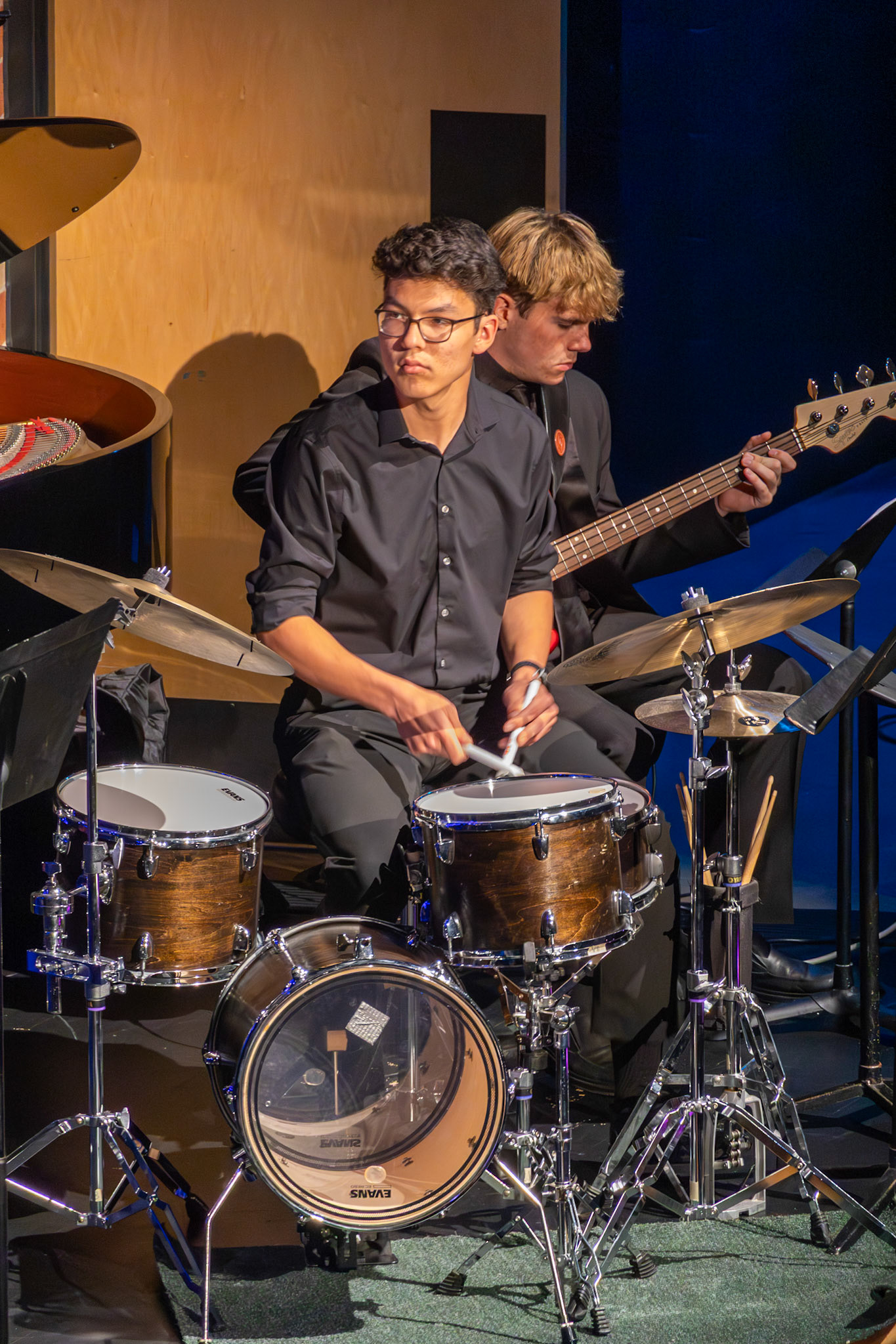 Valin Barrett keeps time on the drums while Andrew Barnum anchors the song on bass. (Photo by Mackenzie Popma)