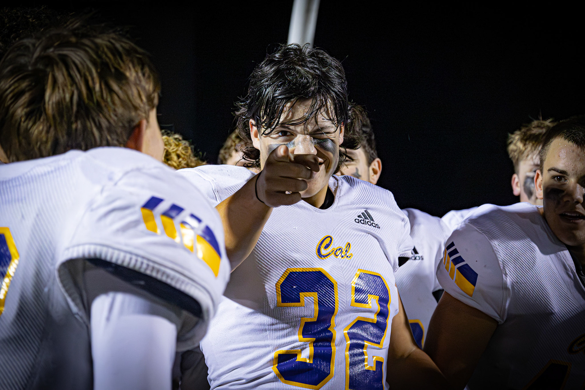 After a huge win against the Jenison Wildcats Blake Whitlock gives the camera a point indicating their on to the next one. (Photo by Ella-Grace Wickens)