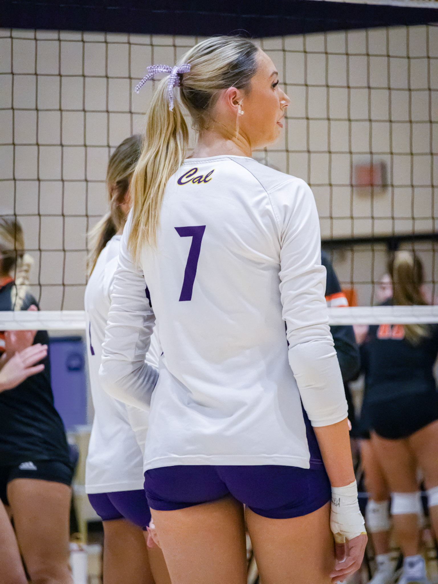 LIVING IN THE MOMENT  Senior Kyla Charles ready to face off the Byron Center Bulldogs on Senior Night. "When we are entering a more challenging game we have to make sure to be uplifting to each other and always be positive because if one person gets down the whole team is down," Kyla explained. (Photo by Tana Coates)