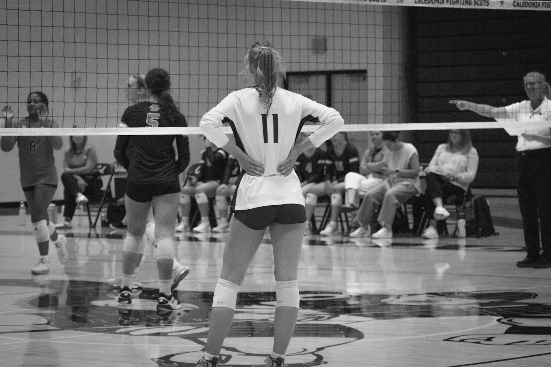 Maggie Loomis, senior, watches the opponent closely, prepared for the next play. (Photo by Kortney Muller)