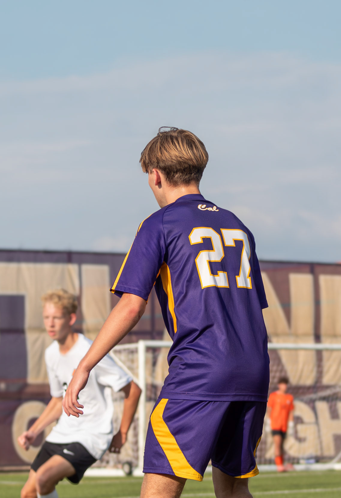 HOLDING THE LINE  Zach Prikola locks down the defense, focused and ready for the next play. (Photo by Avery Hitsman)
