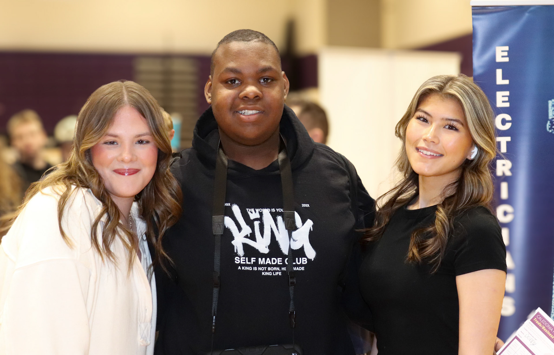 Kiara Cogswell, Danny Donaldson and Presley Tidey check out the Trade Fair. (Photo by Elsha Bytwork)