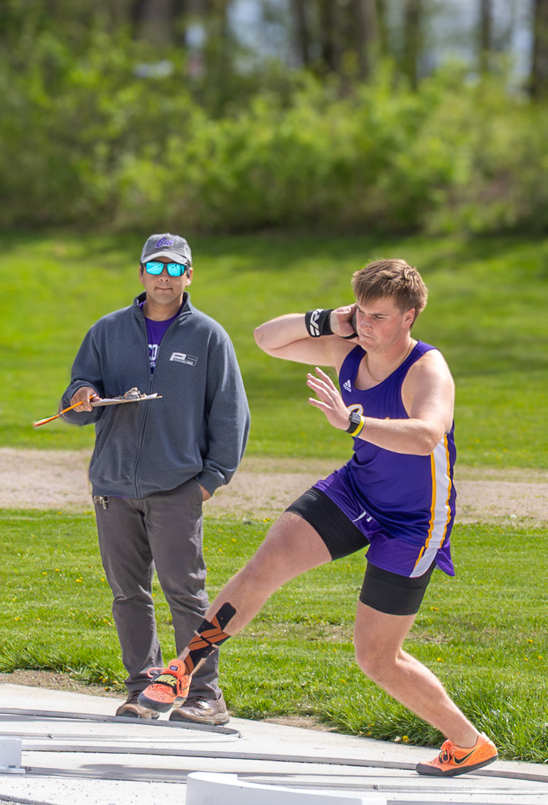 Elliot Clark turns through the circle, spinning with control and building momentum as he prepares to release the throw. (Photo by Aibree Akers)