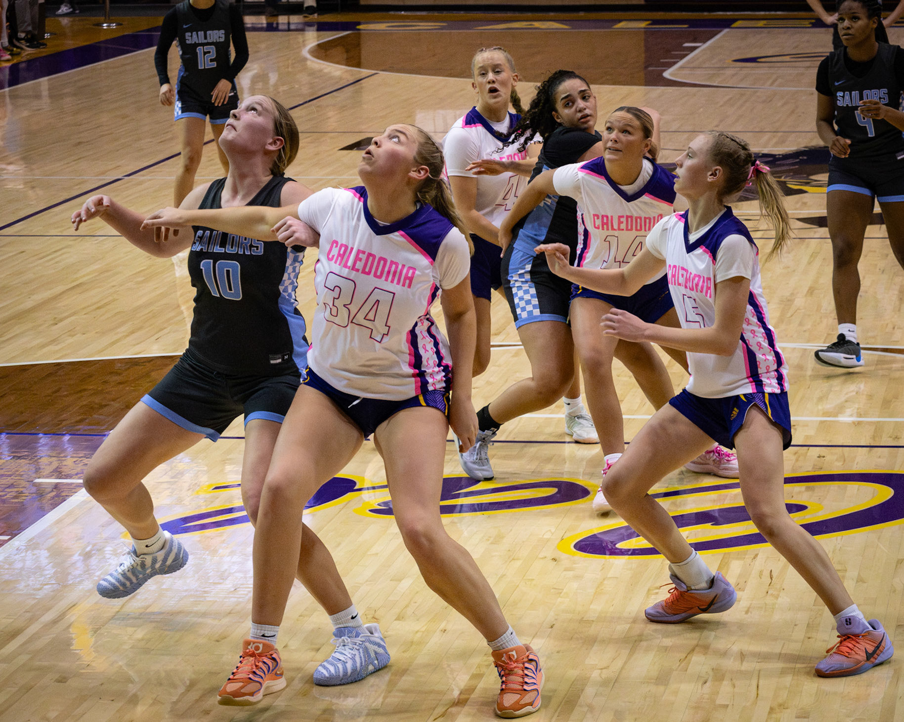 Relentless on the boards, boxing out and battling for every rebound. (Photo by Aibree Akers)