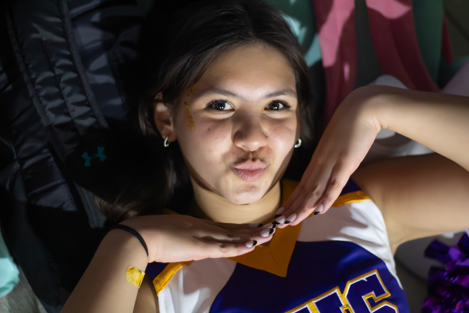 Juliana Apo taking a small rest after the firt quarter of the Hoco Game. (Photo by Lauren Parker)