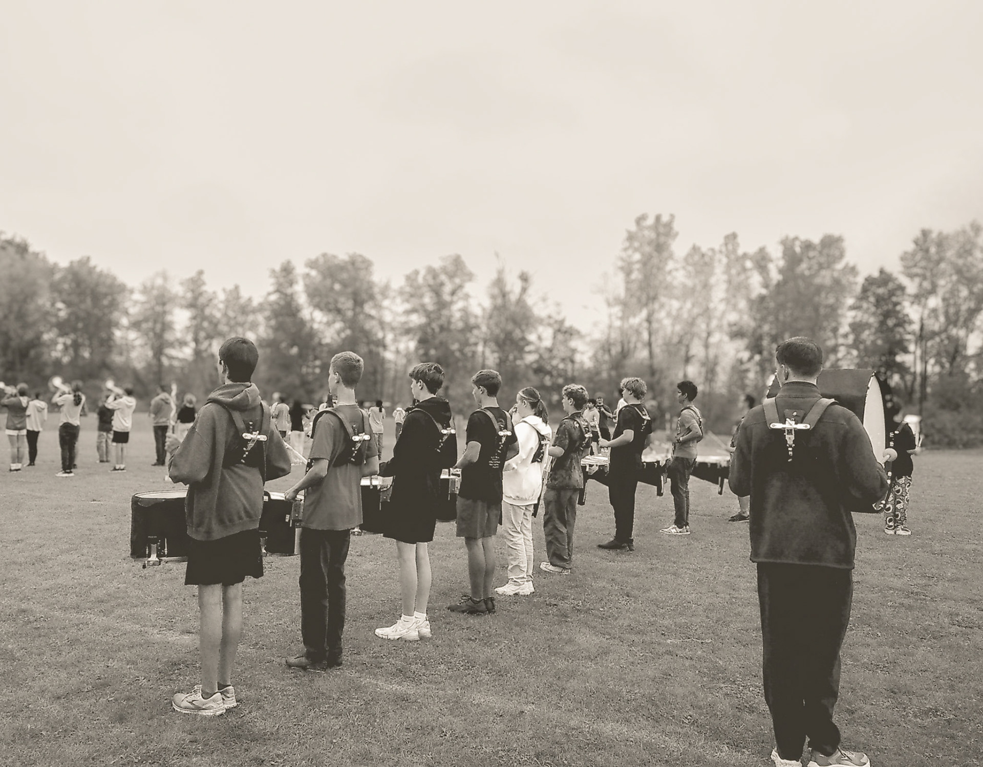 On a late fall day, the marching band locates their positions on the practice field. (Photo by Baylee DeVries)