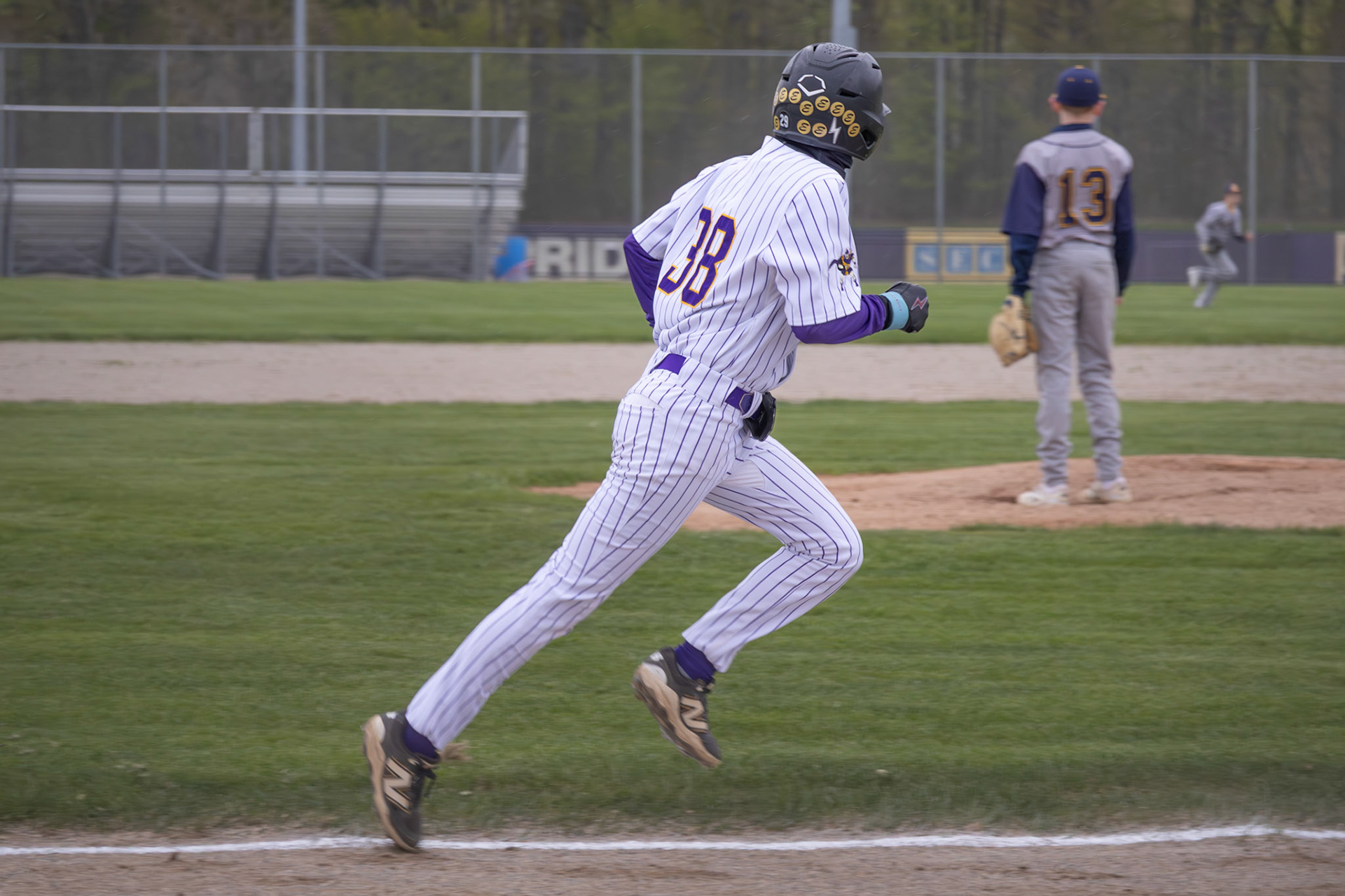 Landon Horan runs from home to first base. (Photo by Emma Garza)