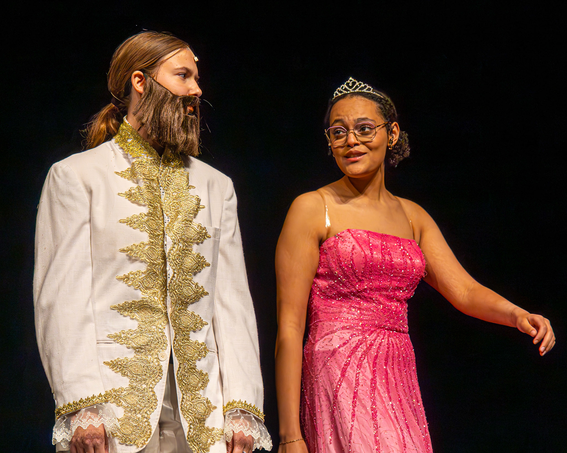Zahara Muriithi and Sophia Steenwyk shine on stage as the duo embodies the roles of father &amp; daughter in the beloved Princess and the Frog segment of the Brothers Grimm Spectaculathon play. (Photo by Caralyn Price)