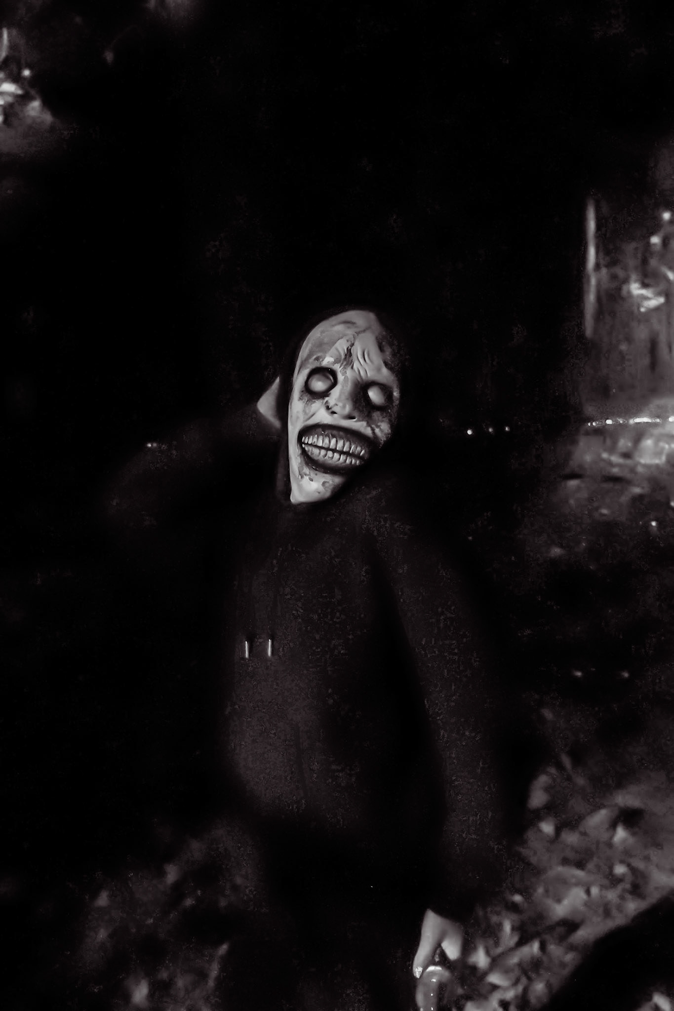 Hiding in the forest, a spooky mask awaits. (Photo by Madelynn Pittman)