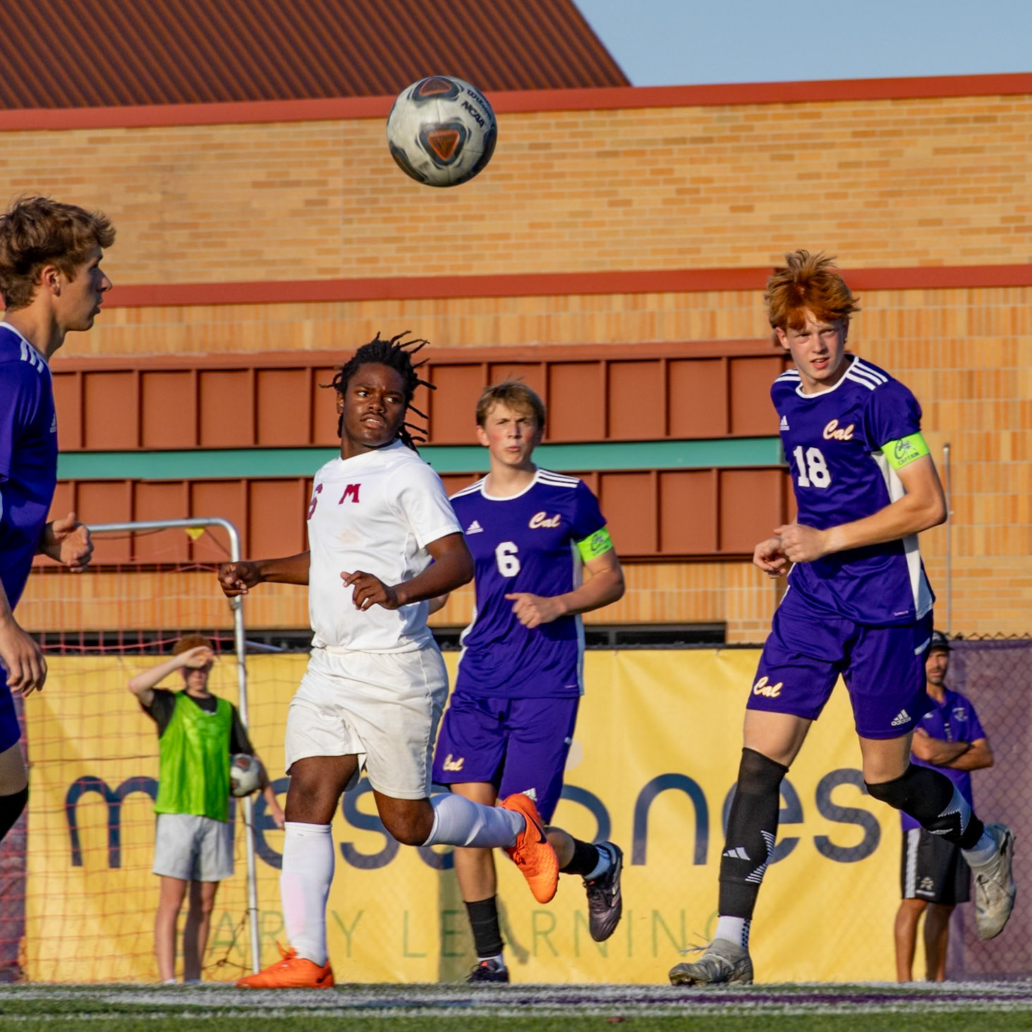 Noah Kaplan focuses on the ball as Brecken Byrd scans the field.(Photo by Vivian Hoffman)