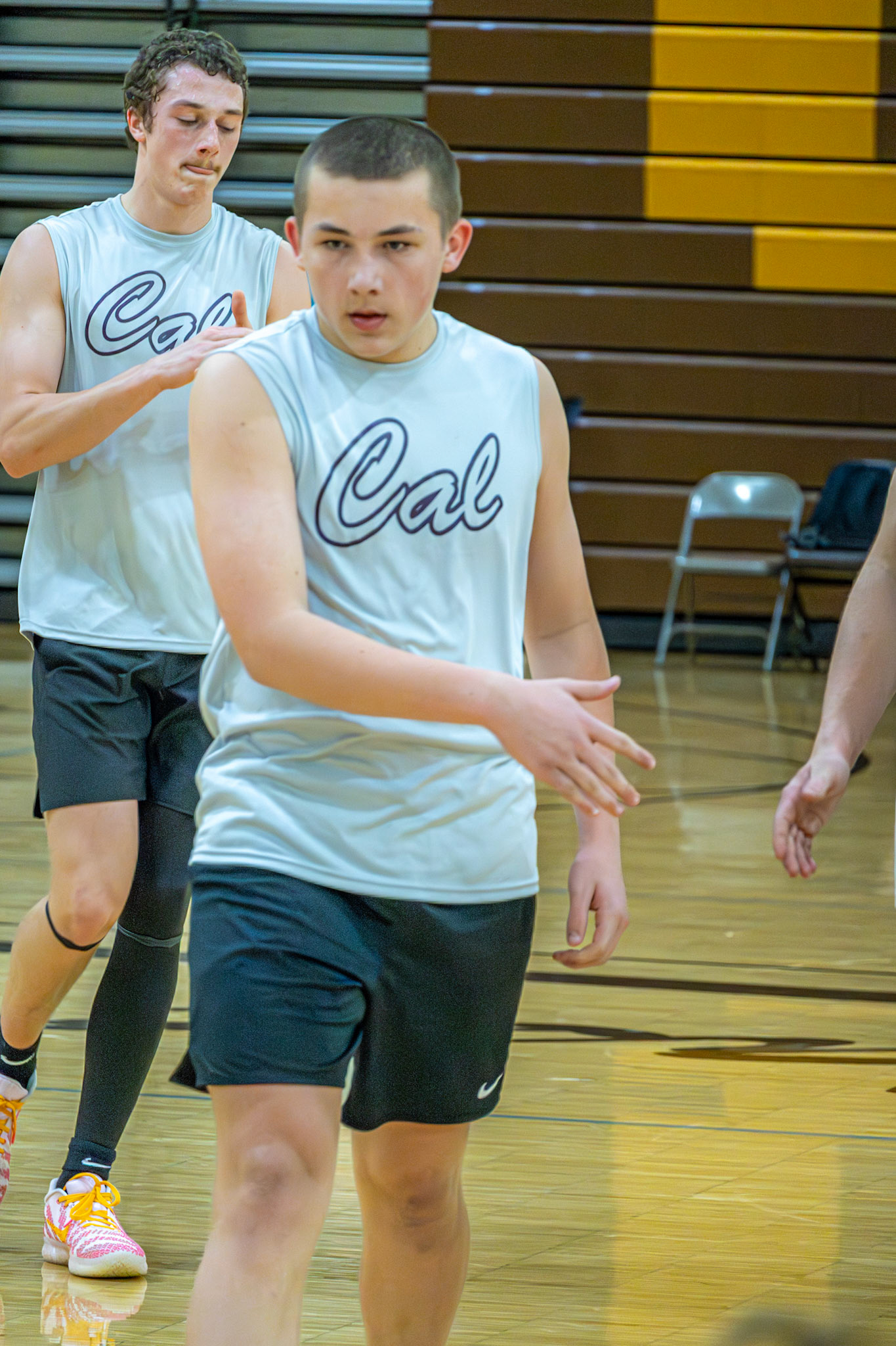Even after the buzzer, Casen Lems keeps his focus as he walks off the court. (Photo by Natalia Teneyuque)