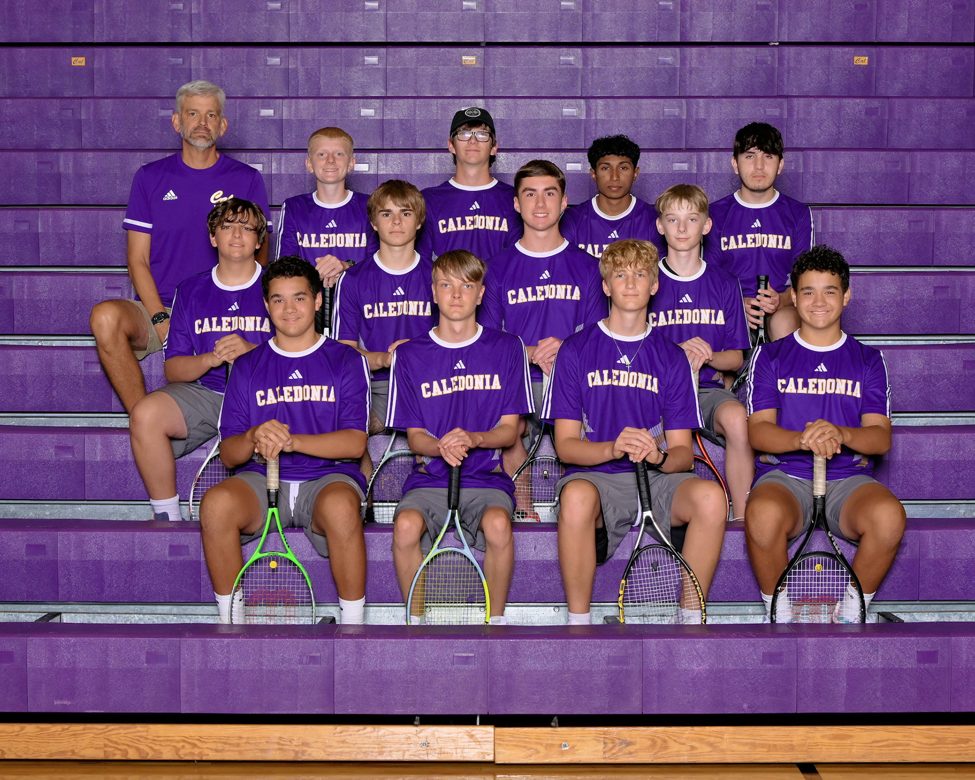 JV Boys Tennis (Photograph displayed with permission from Geskus Photography Inc.)