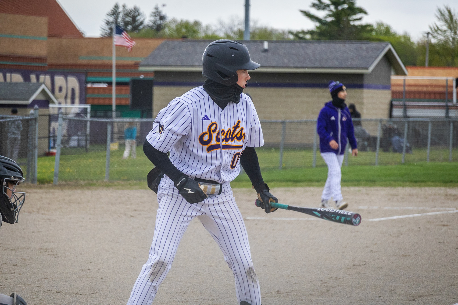 Logan Pratt gets ready in the batter's box before his first swing. (Photo by Emma Garza)