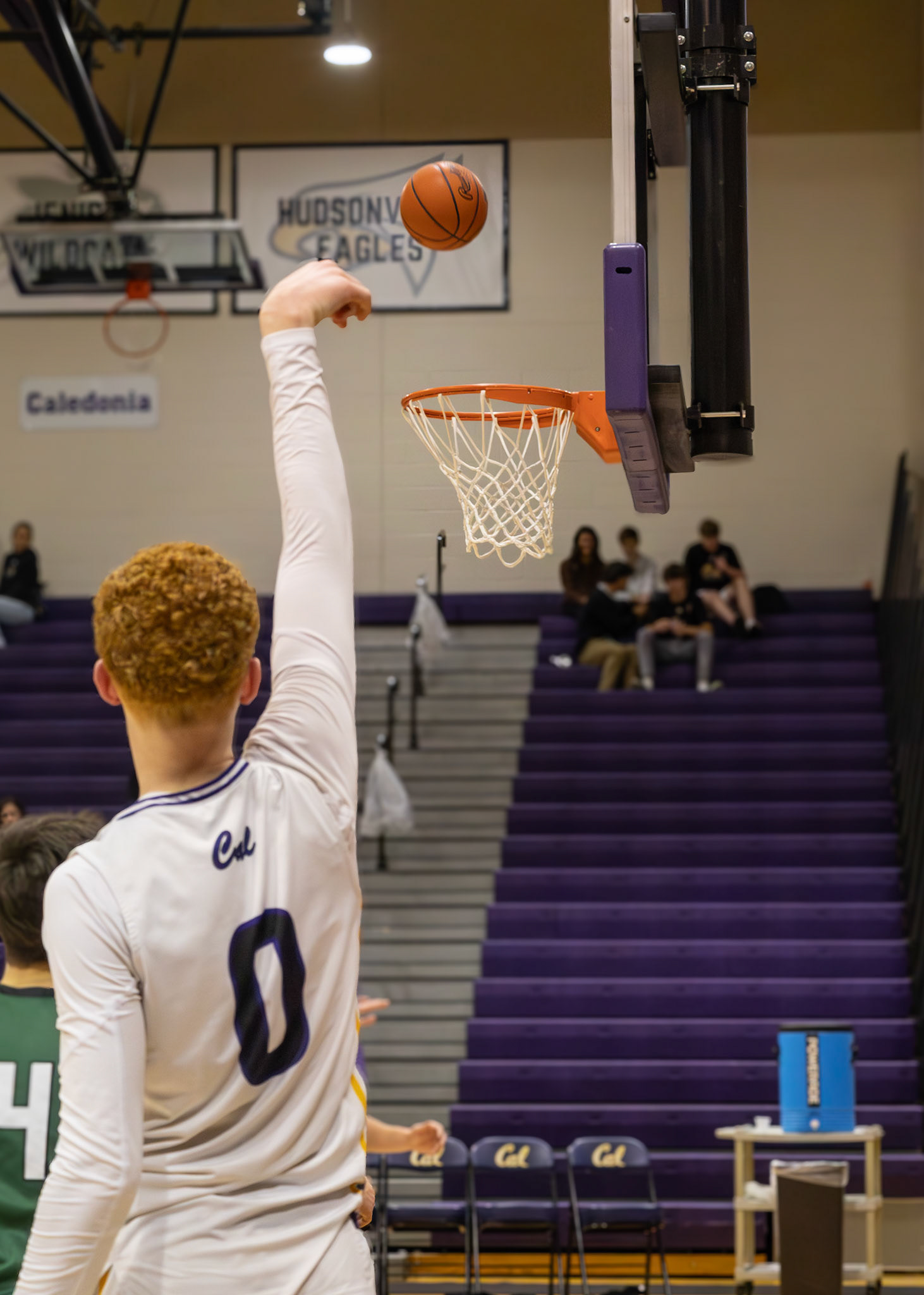 CONFIDENCE Owen Bloemers shoots to score against Jenison. (Photo by Adi Malvankar)