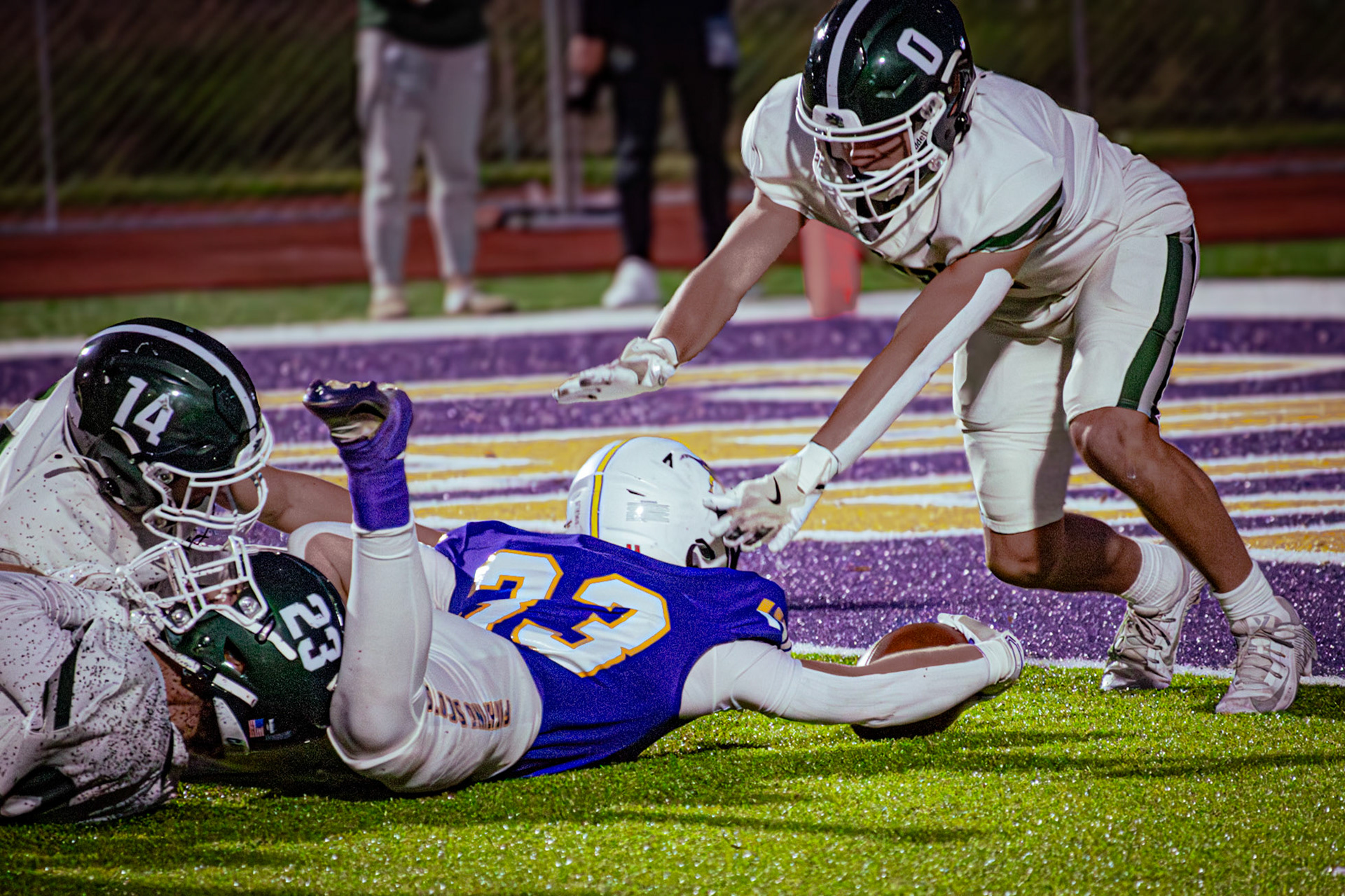 Ryne Wysocki gives it everything he’s got to reach the end zone on an incredible play. (Photo by Egan Otto)