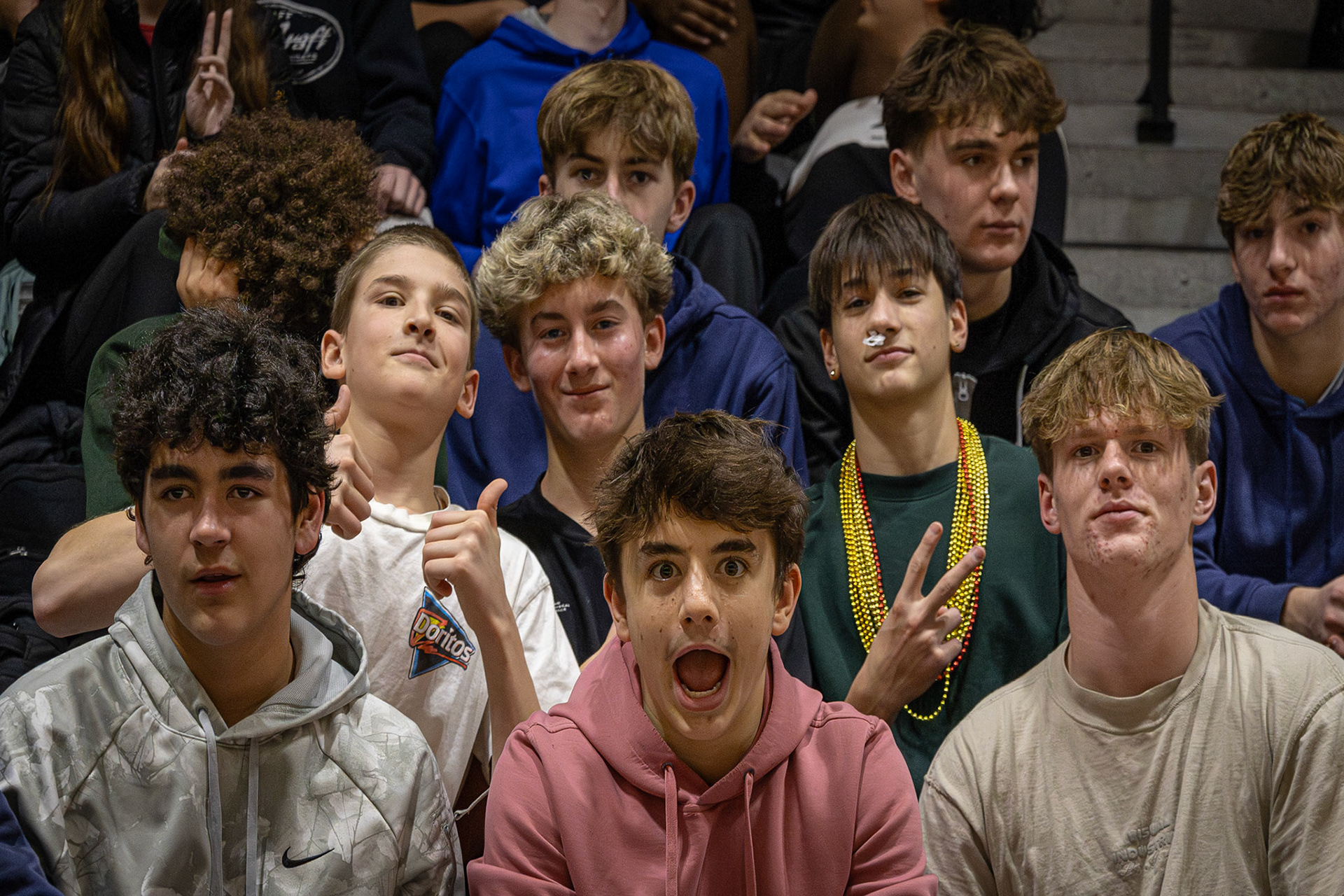 Laughing through every game: Gerrit Bottum, Noah McKnight, Nolan Van'tHof, Evan Crater, Jackson Heffner, and Zach Fisher. (Photo by Ella-Grace Wickens)