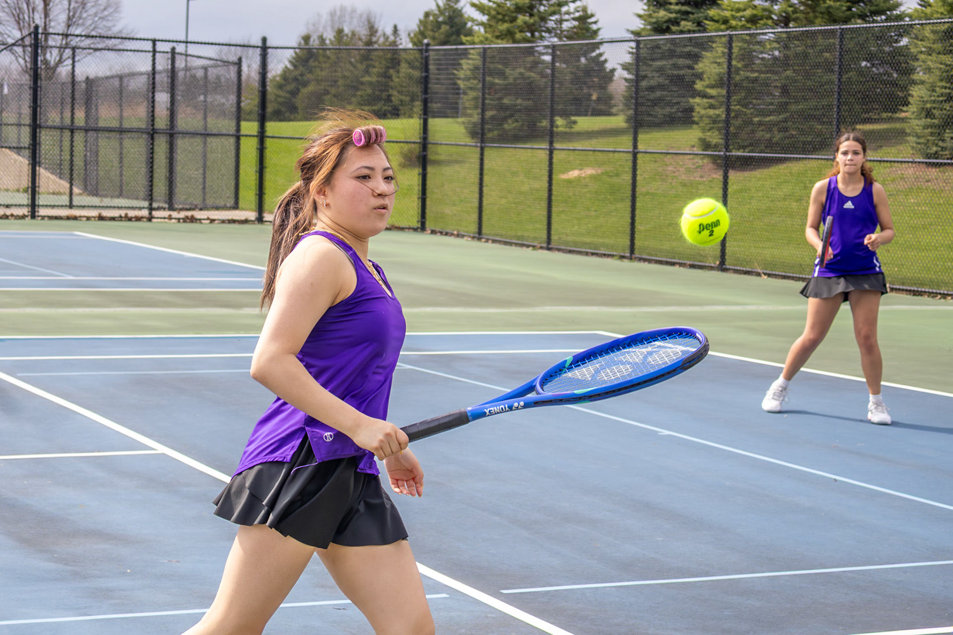 Chelsea Tran and Payton Walker work the court together, combining steady teamwork and focus to take the win. (Photo by Hailey Thayer)