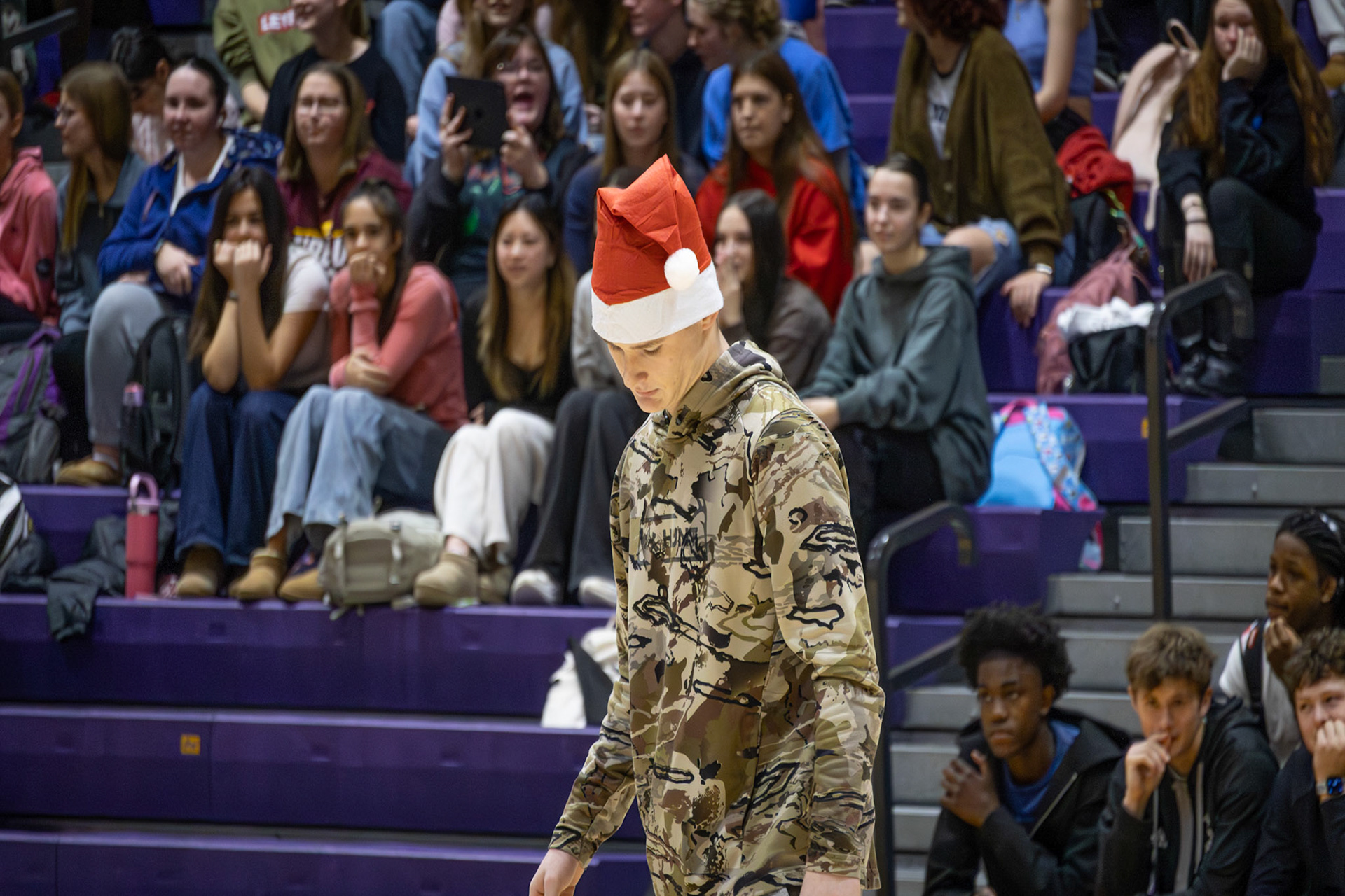 GAME PLAN Pondering his next move, Trey Shellenbarger intends to capture his next Santa hat. (Photo by Ella-Grace Wickens)