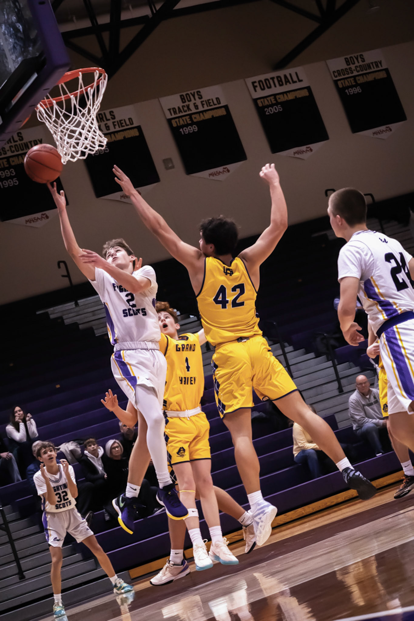 Austin Guider competes for every possesion, attacking the rim. (Photo by Jeremiah Pittman)