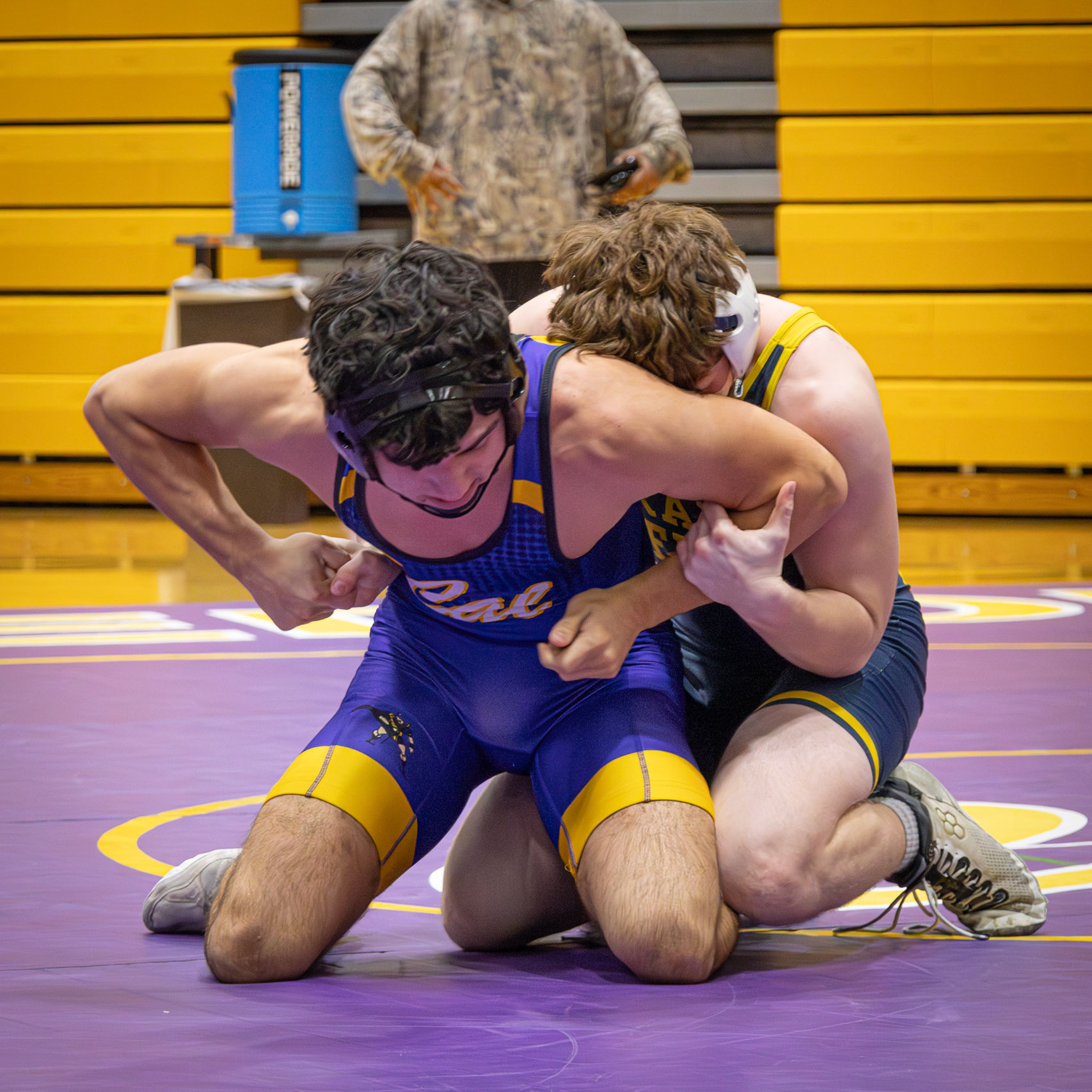 In a tough situation Marco Torrense Gallipoli shows restraint against his opponent from Grand Ledge. (Photo by Rhyan Guzman)