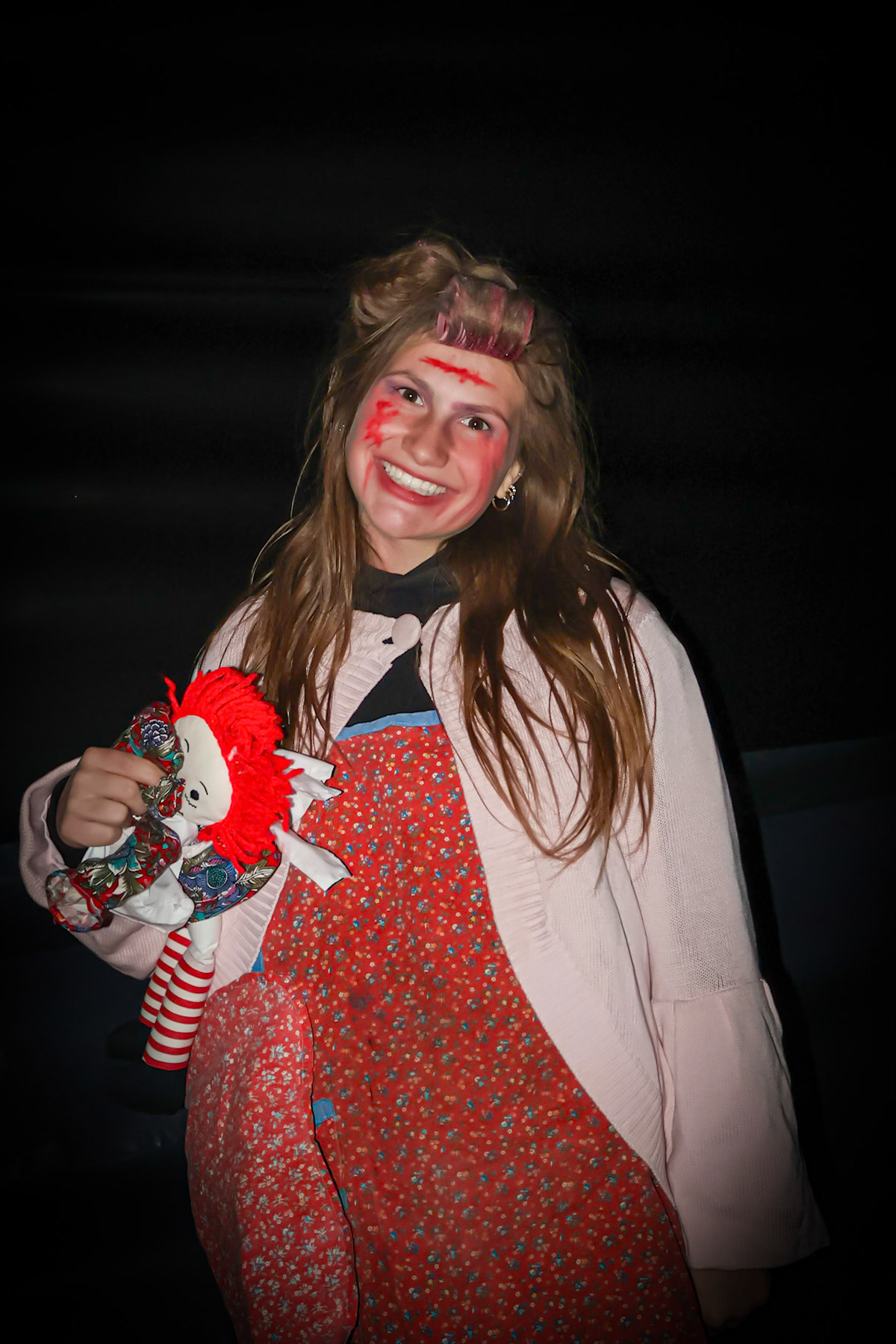 Baby girl Mariah Peterson holds her dolly tight.(Photo by Madelynn Pittman)