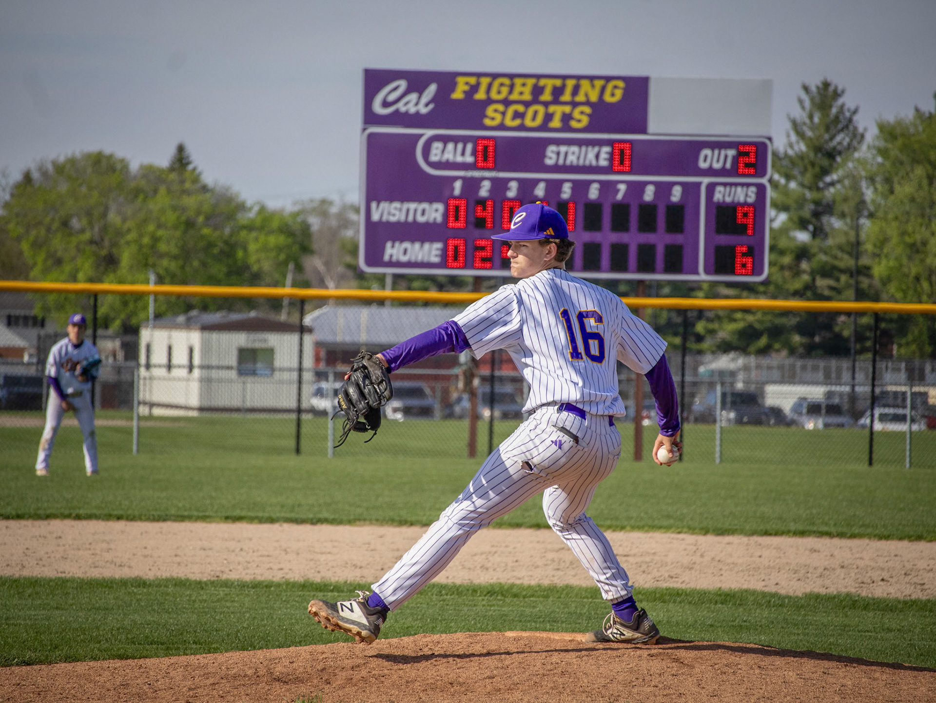 Winding up, Sawyer Tague gets ready to throw a slider for his first pitch. (Photo by Ella-Grace Wickens)