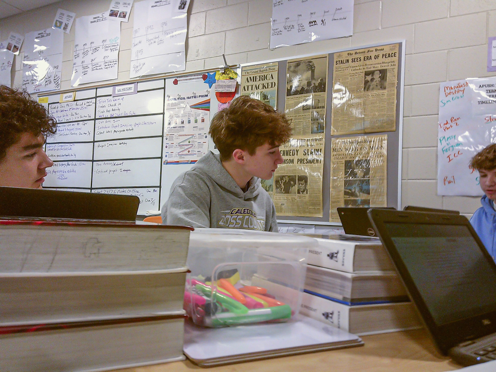 Peering at his partner's paper, Bennet Snapper ponders how to grade his peer. (Photo by Emma Garza)