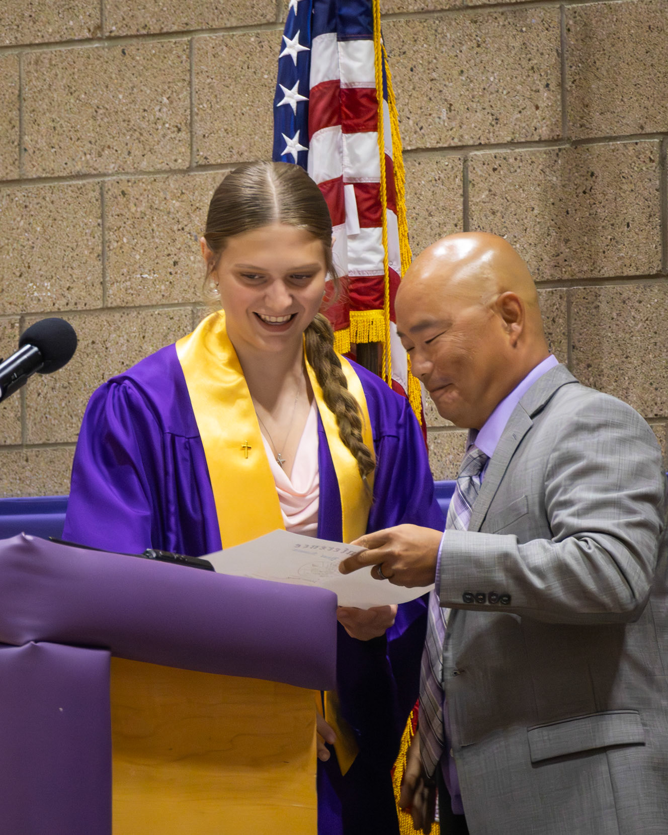 Joie King accepts the female Athlete of the Year award from Athletic Director Phil Miedema. (Photo by Emma Garza)