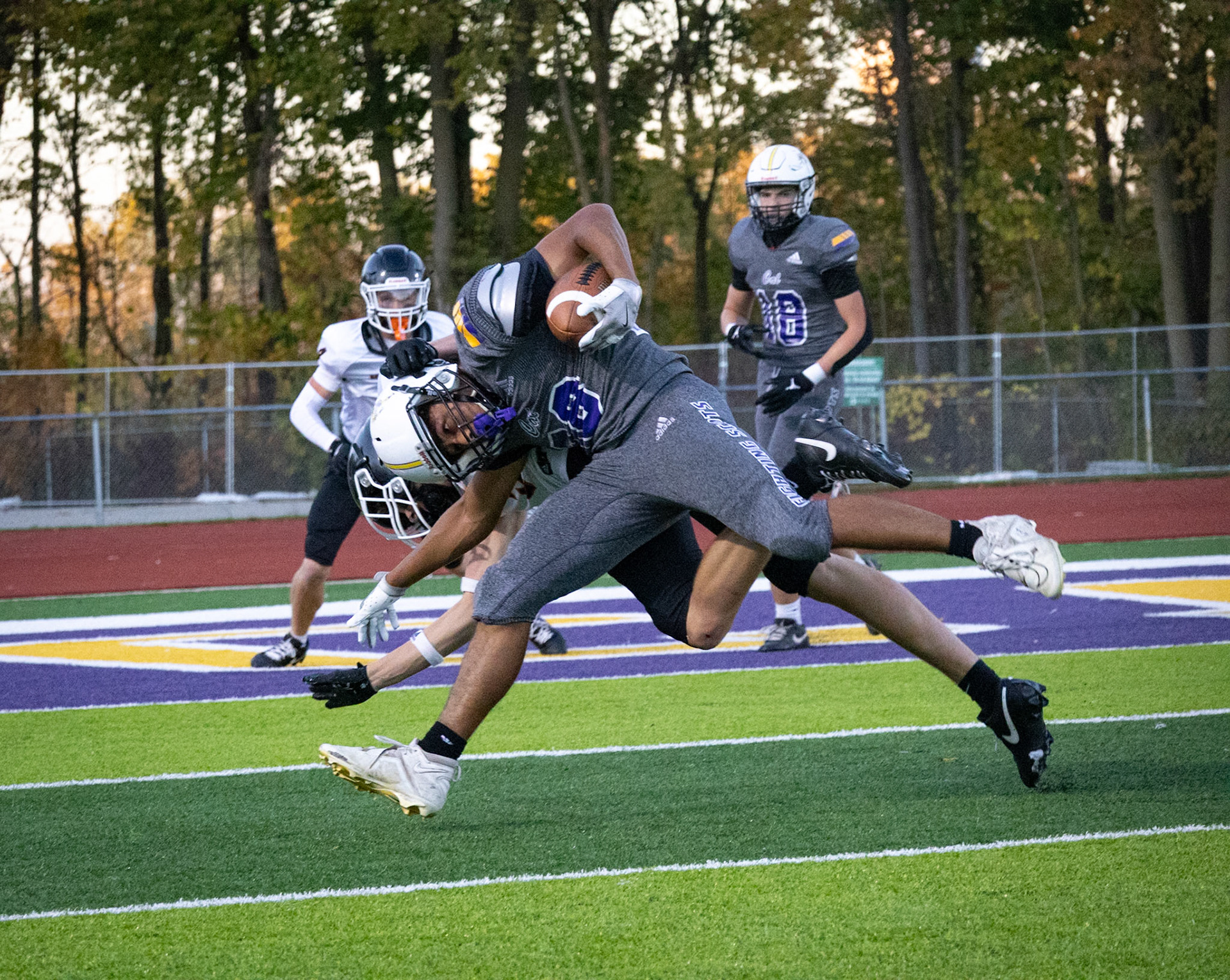 Contact made, touchdown earned. Sophomore Robert Restau, driven by power and passion. (Photo by Khloe Lowande)