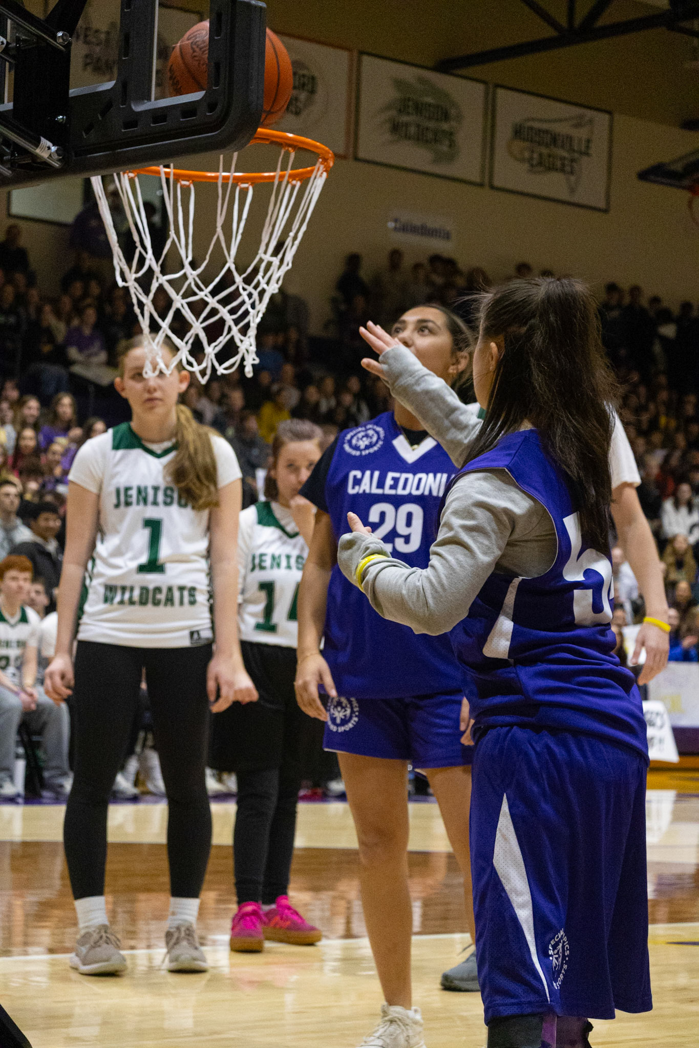 Ally Musk makes the first basket, kicking off scoring in the Unified game. (Photo by Avarey Lippert)