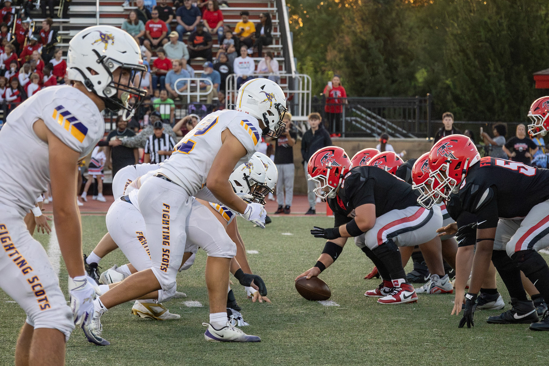 Moments before the snap, tension builds as both sides focus on the play ahead. (Photo by Avarey Lippert)