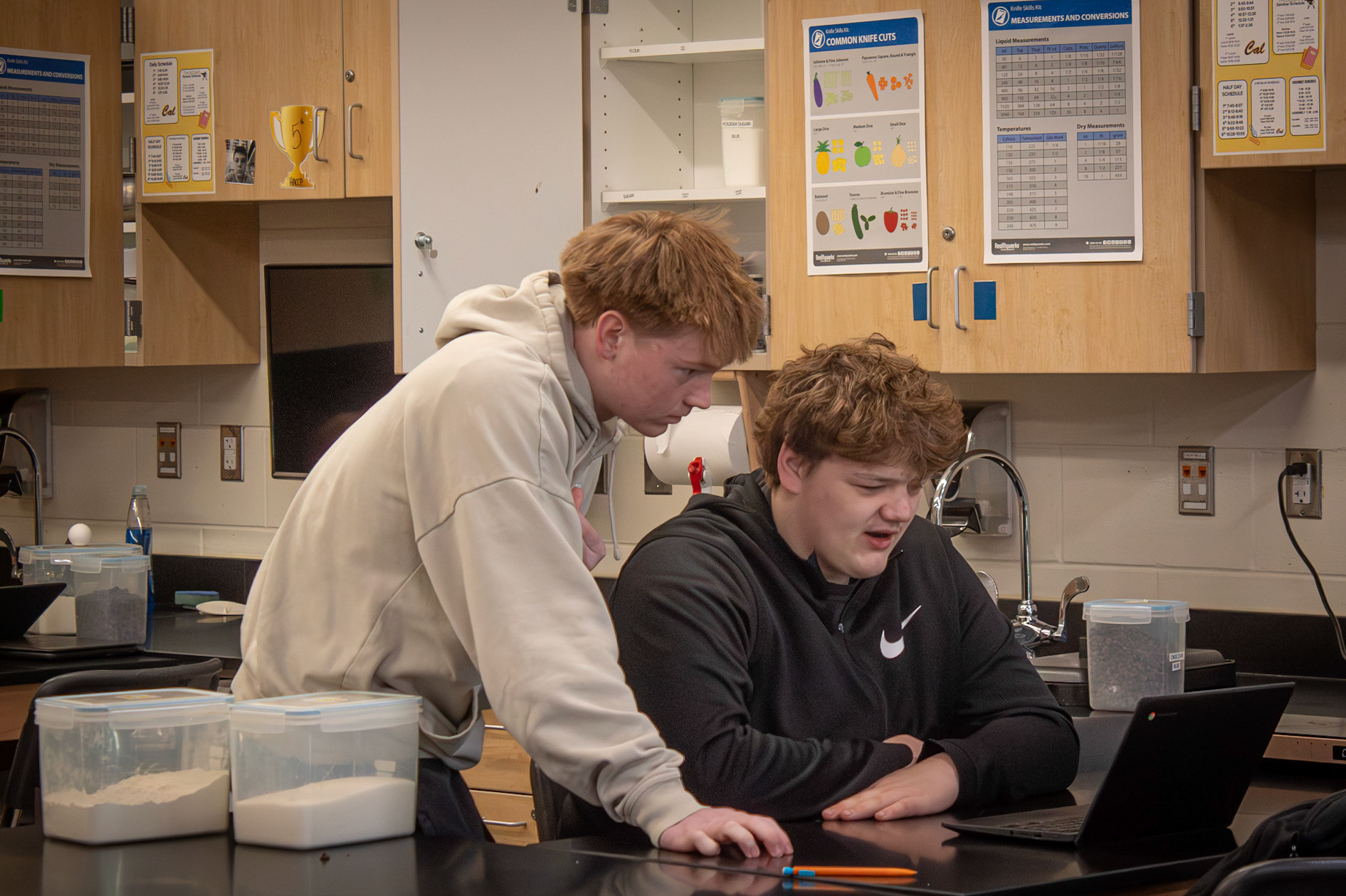 Grady Nelson and Thomas Fryers find a yummy cookie recipe in Food Science. (Photo by Chloe Smith)