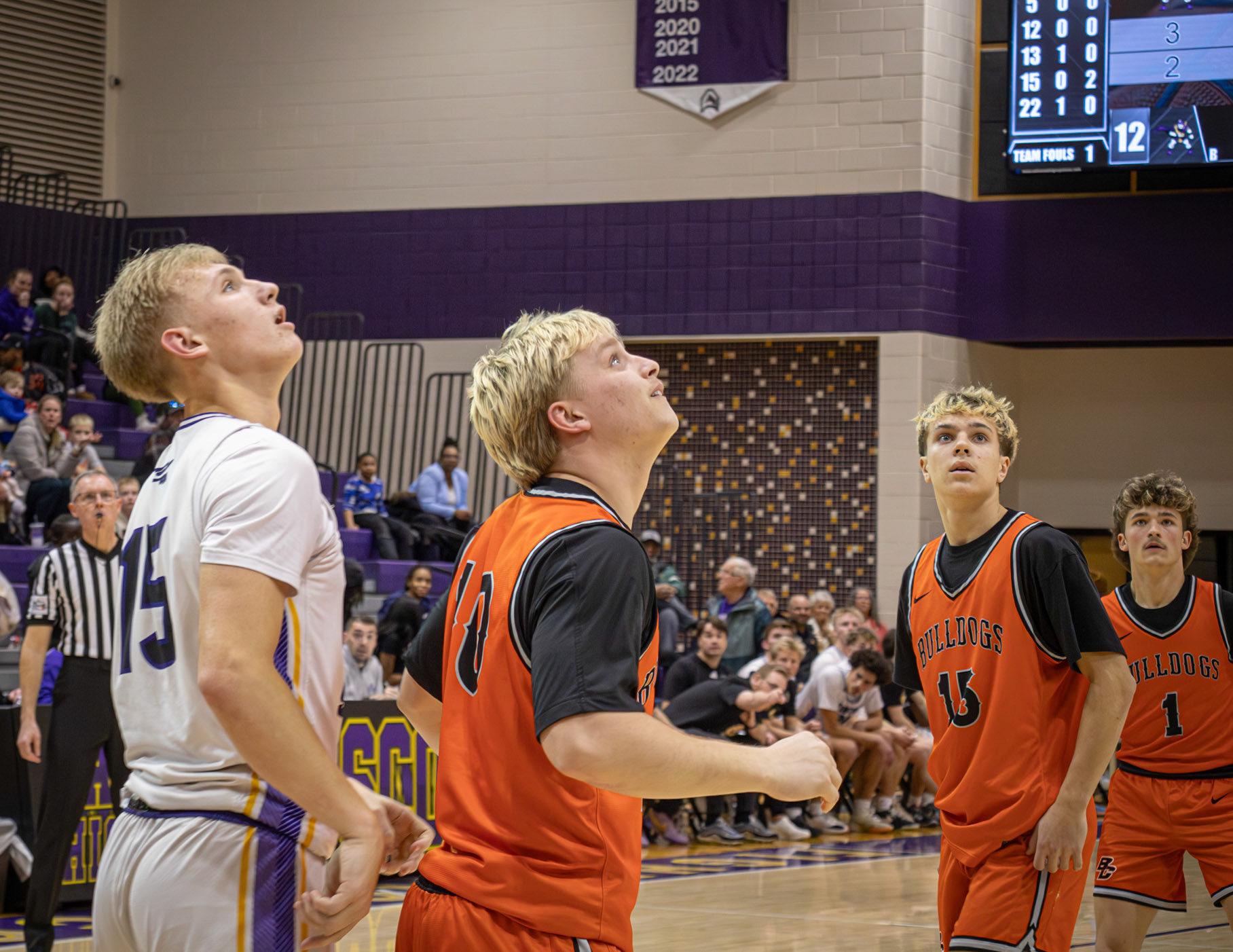 Bryce Backus watches patiently as a teammate’s shot heads toward the basket, hoping to take the lead. (Photo by Emma Garza)