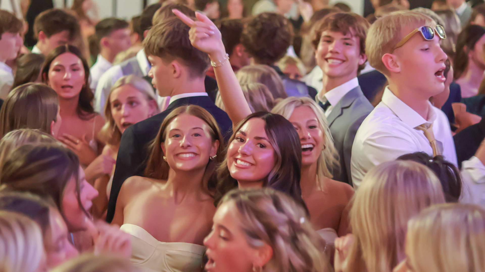 In the middle of all the chaos, Vivian Fink and Averie Rosted still found the camera! (Photo by Natalia Teneyuque)