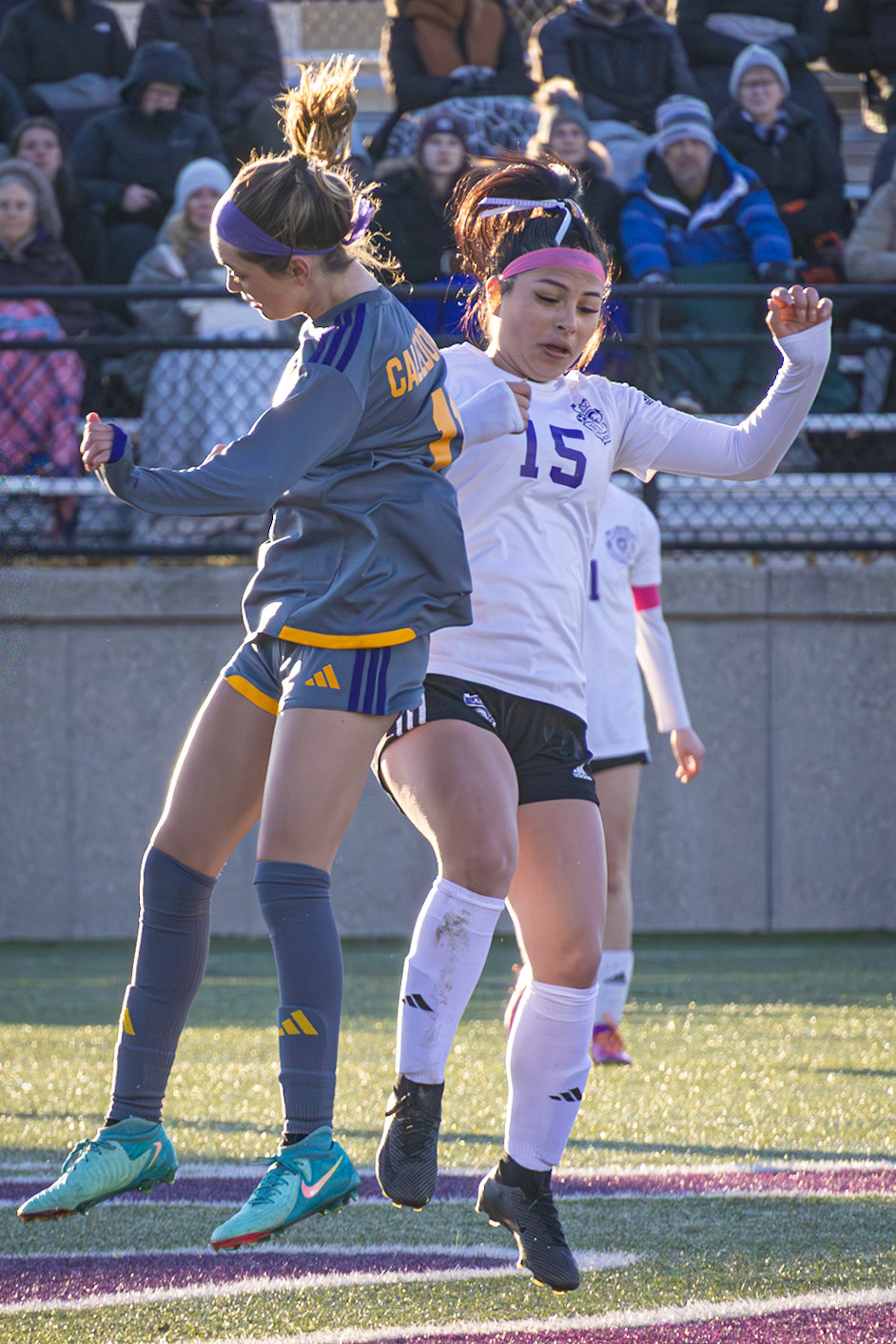 Madelyn Terryn battles No. 15 for possession. (Photo by Rhyan Guzman)