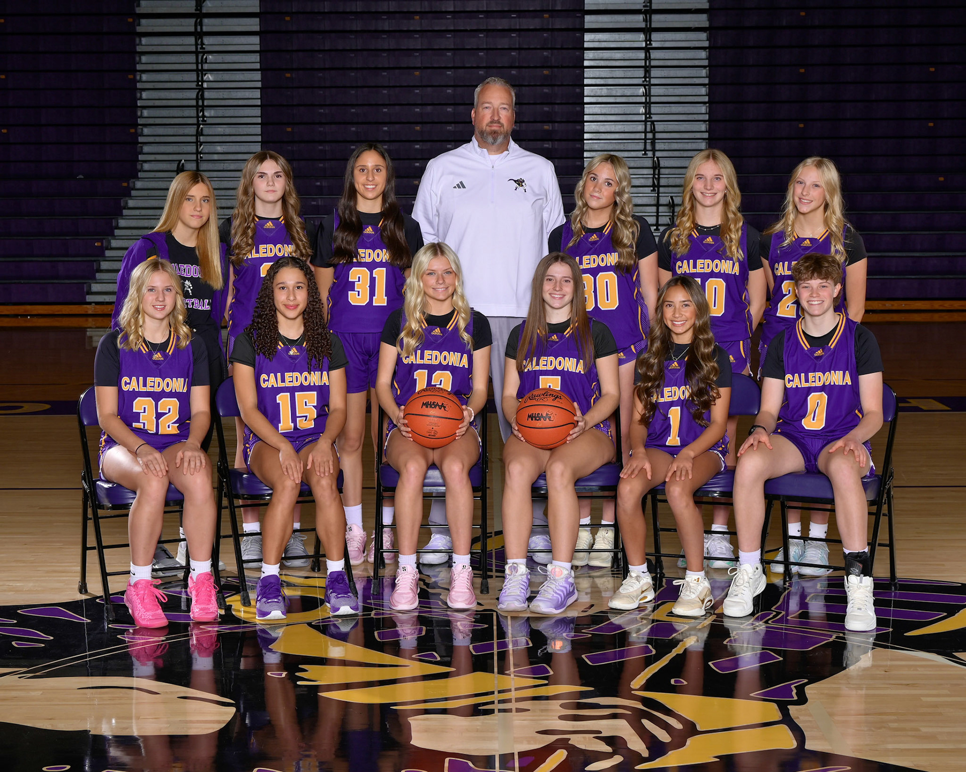 JV Girls Basketball (Photograph displayed with permission from Geskus Photography Inc.)