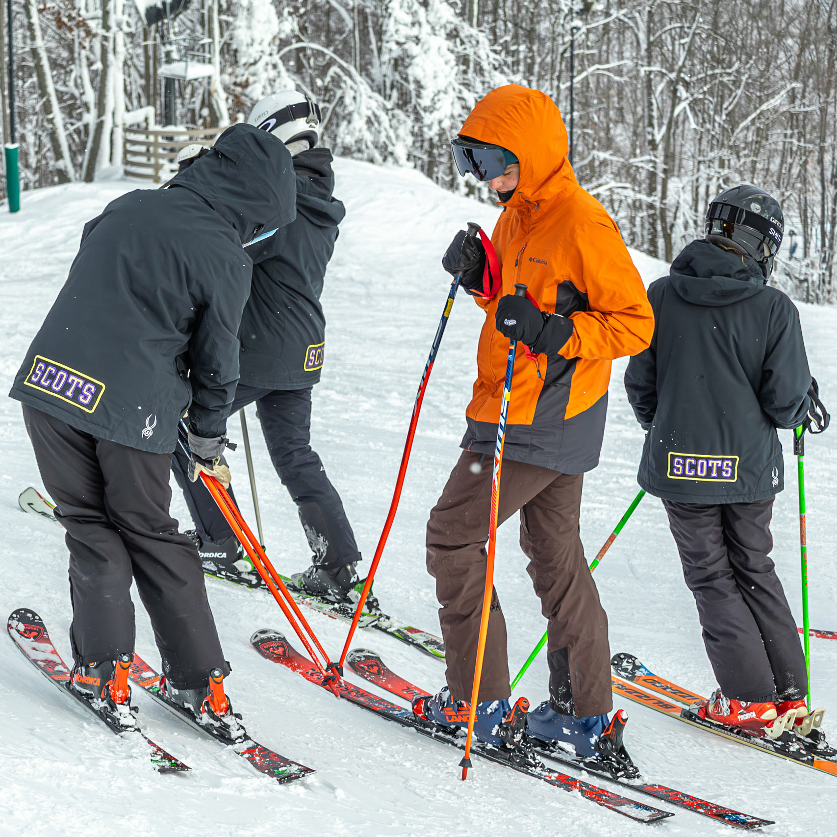 Justin Harper tries to pop Madison Reynolds’ skis off, but she blocks him with her poles. (Photo by Justin Harper)