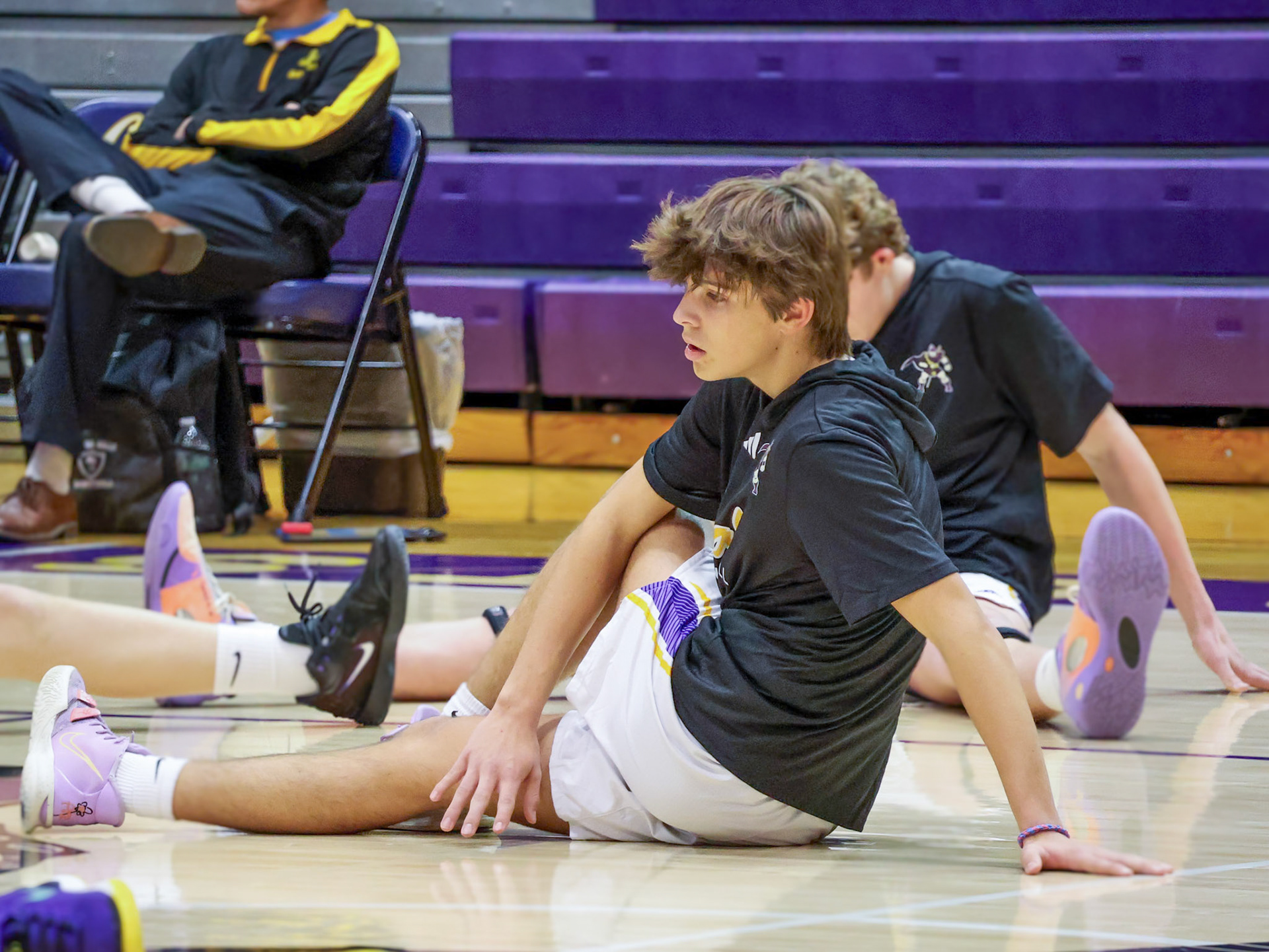 Locked in and ready—Cole Thompson stretches out, focused before game time. (Photo by Mackenzie Popma)