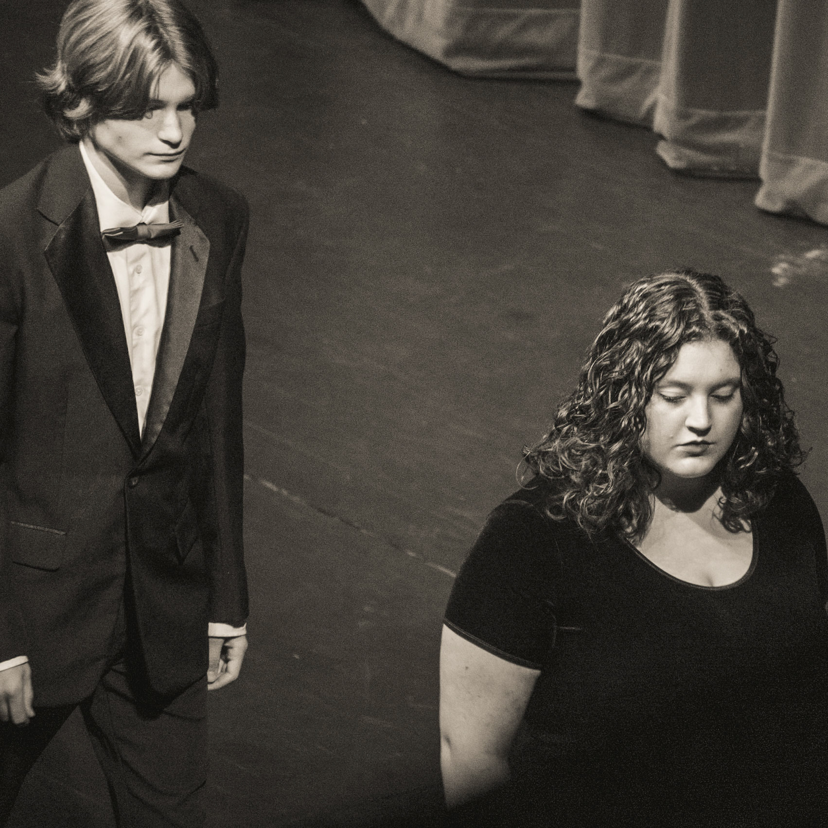 Cody Winters and Ella Rigley of Chamber Choir walk in to perform Have Yourself a Merry Little Christmas.